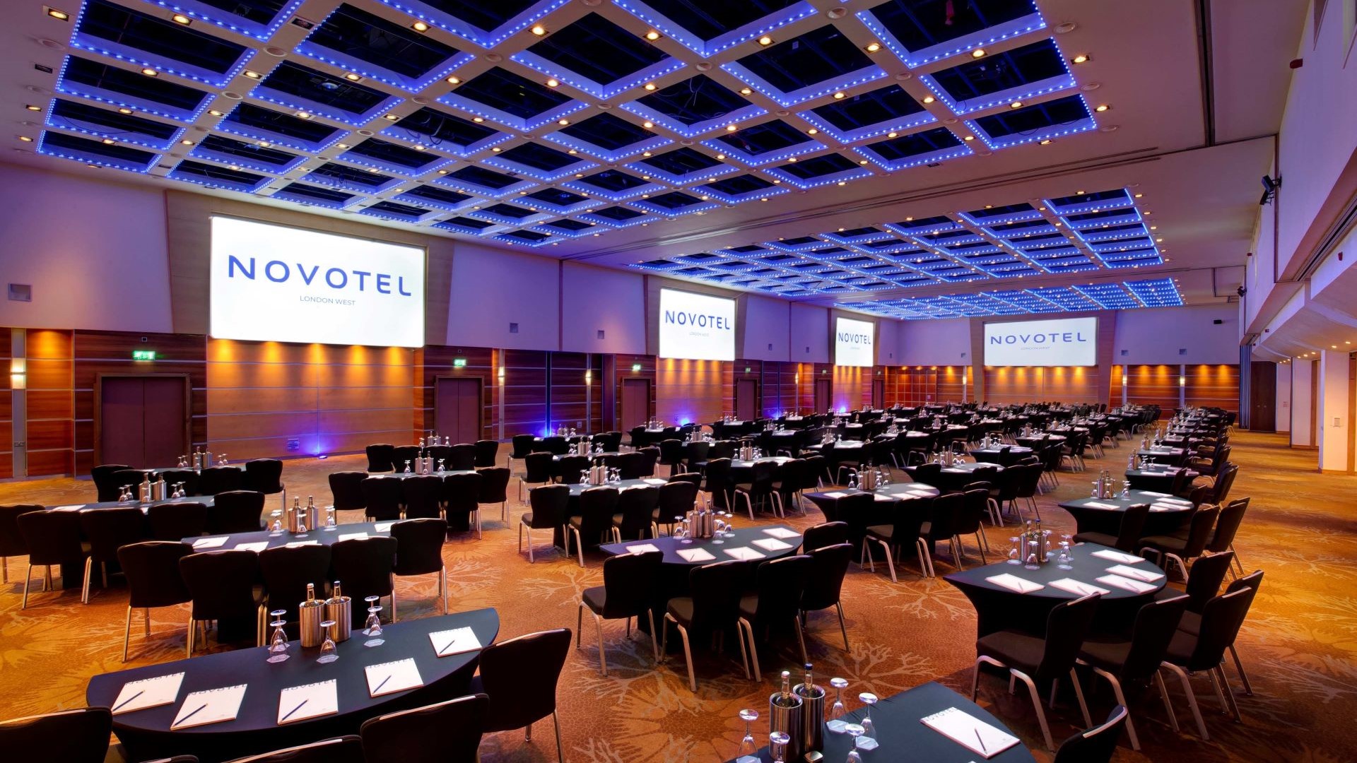 Spacious conference room at Novotel London West for corporate events with modern design.