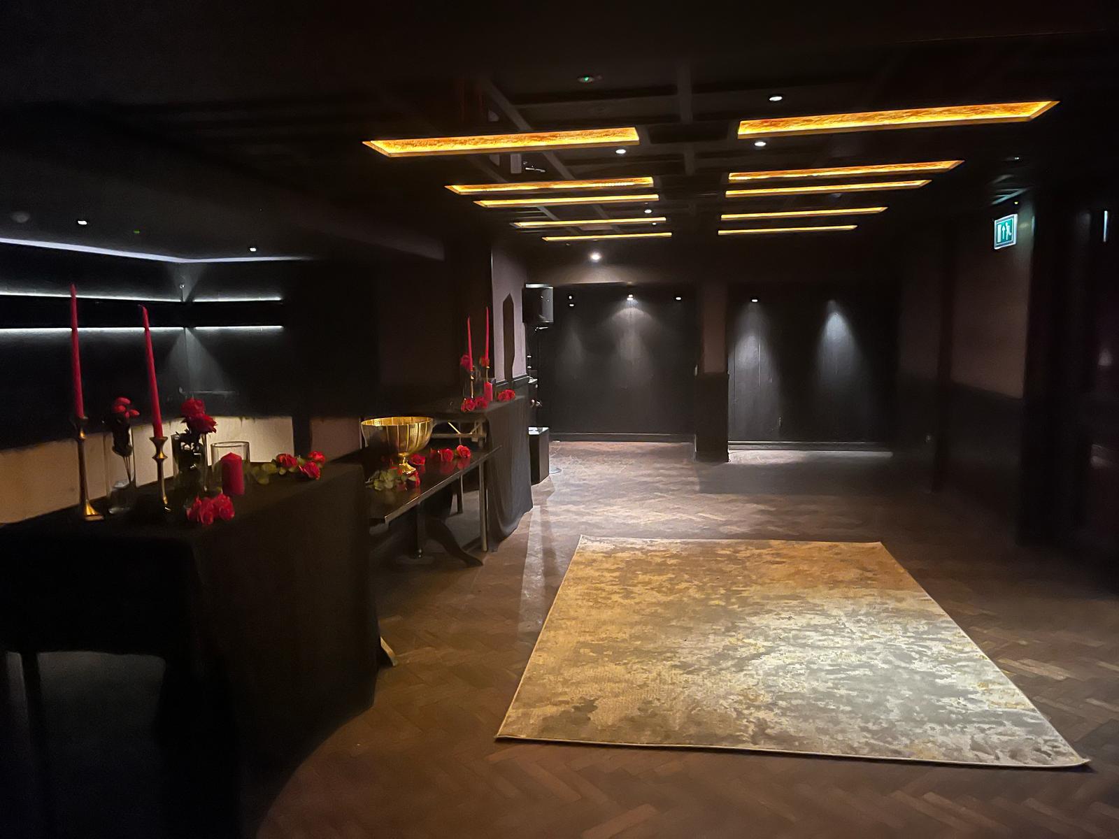 Elegant 145 Knightsbridge venue, dim lighting, upscale event
