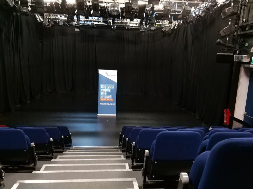 Black-box theater at Brentwood Auditorium, ideal for intimate speaker series and workshops.