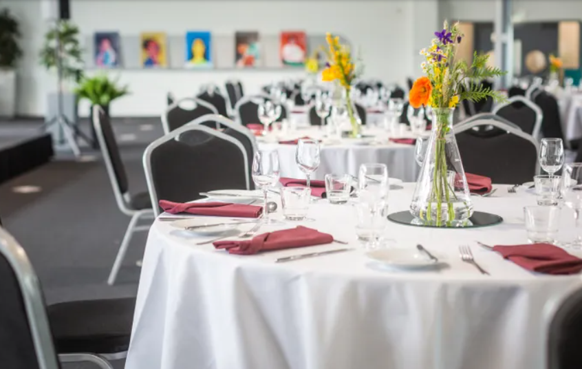 Banquet setup in Rosalind Franklin Room at We the Curious for corporate events and luncheons.