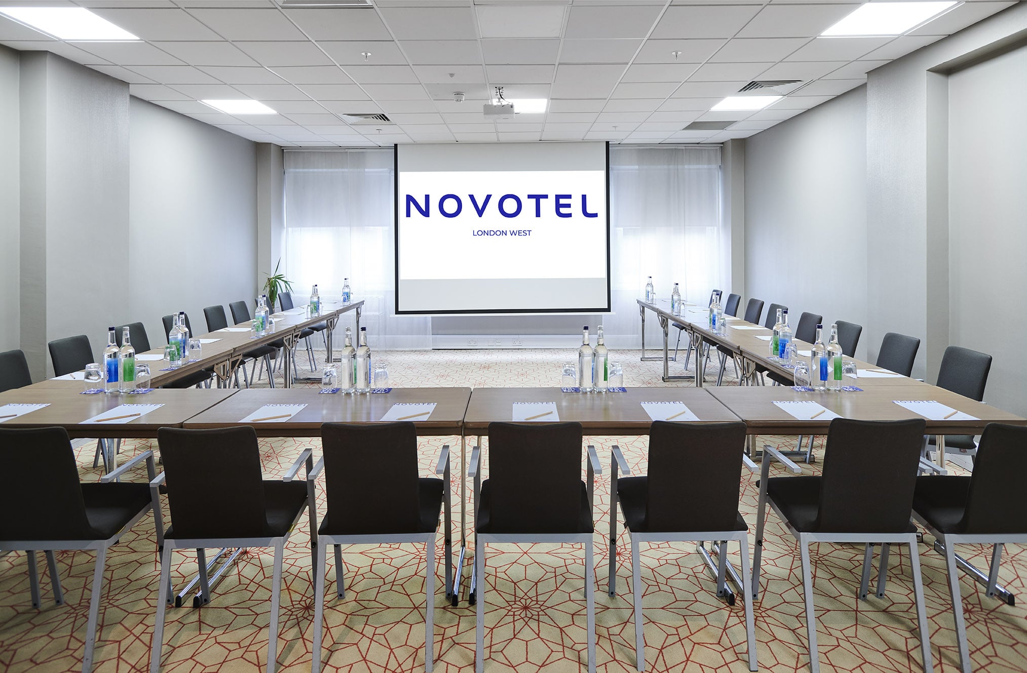 Mouton Cadet meeting room at Novotel London West with U-shaped seating for events.