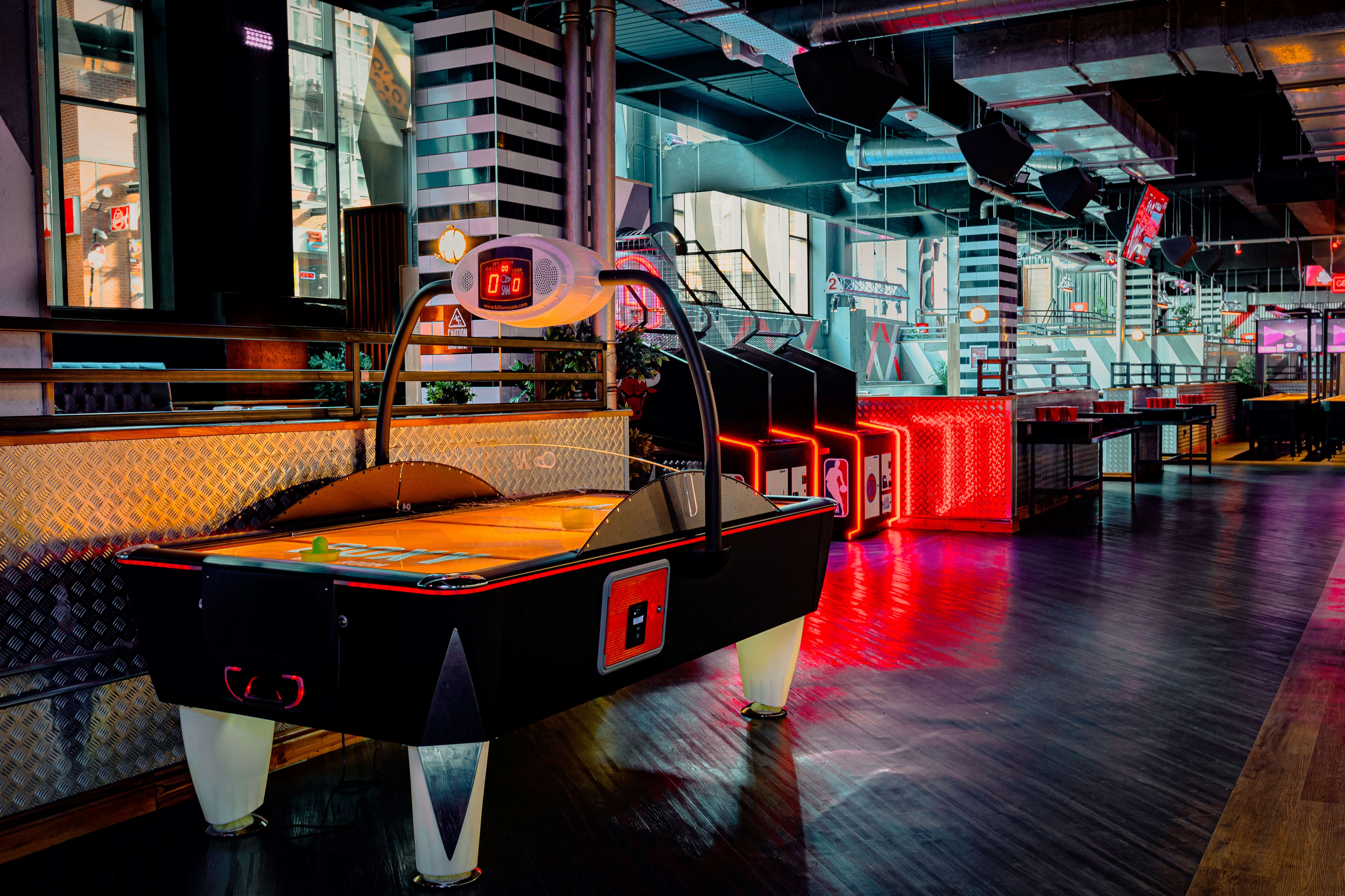 Vibrant Roxy Ball Room venue in Manchester with air hockey for corporate events
