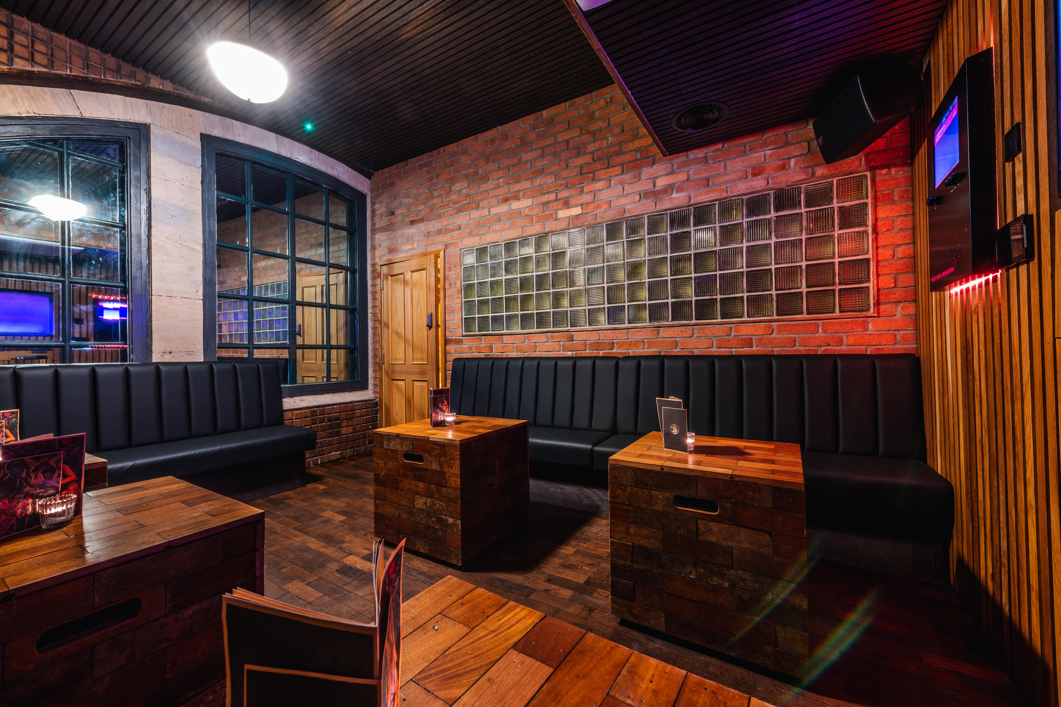 Karaoke room at The Blues Kitchen Manchester, cozy seating for networking events.
