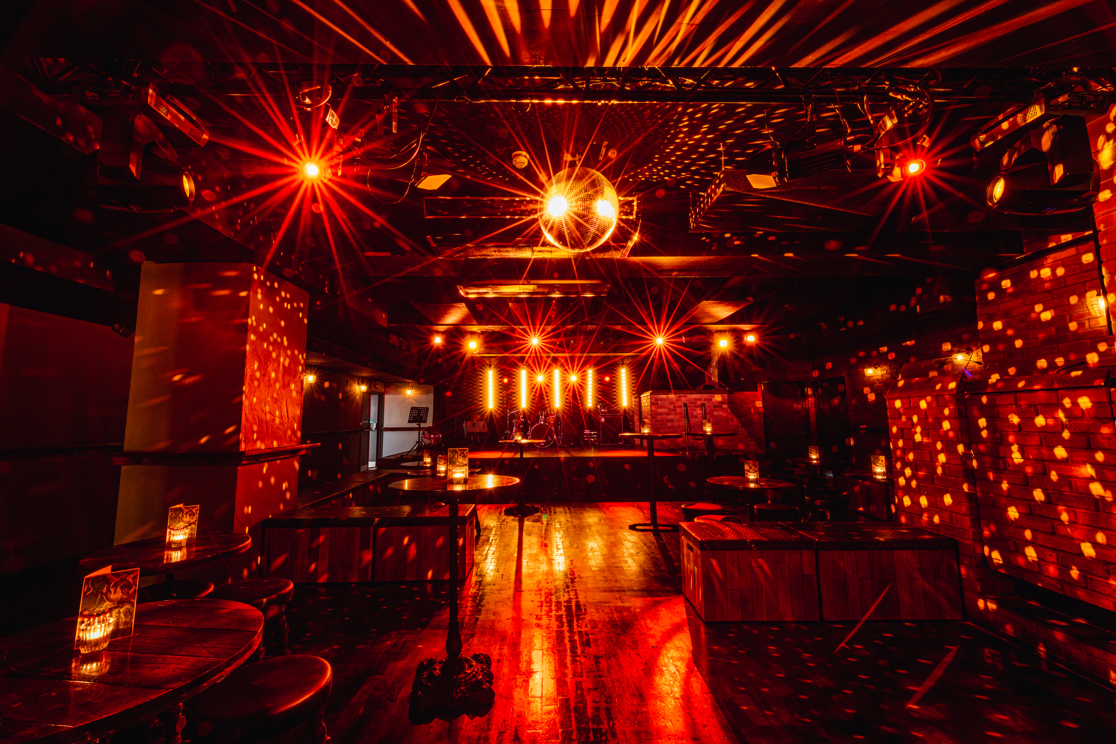 Vibrant Friday Night Live at The Blues Kitchen Manchester with dynamic lighting and disco ball.