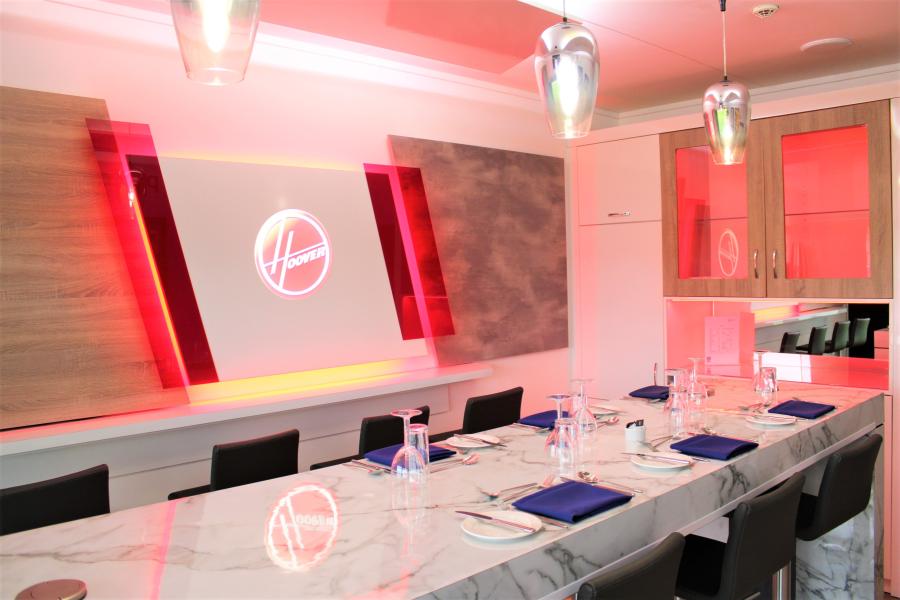 40/Twenty Lounge VIP boardroom with marble finishes for corporate meetings and product showcases.