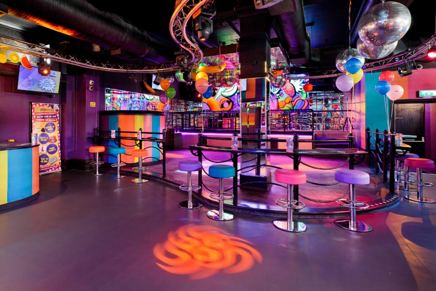 40/Twenty Lounge nightclub at Halliwell Jones Stadium with vibrant seating for corporate events.