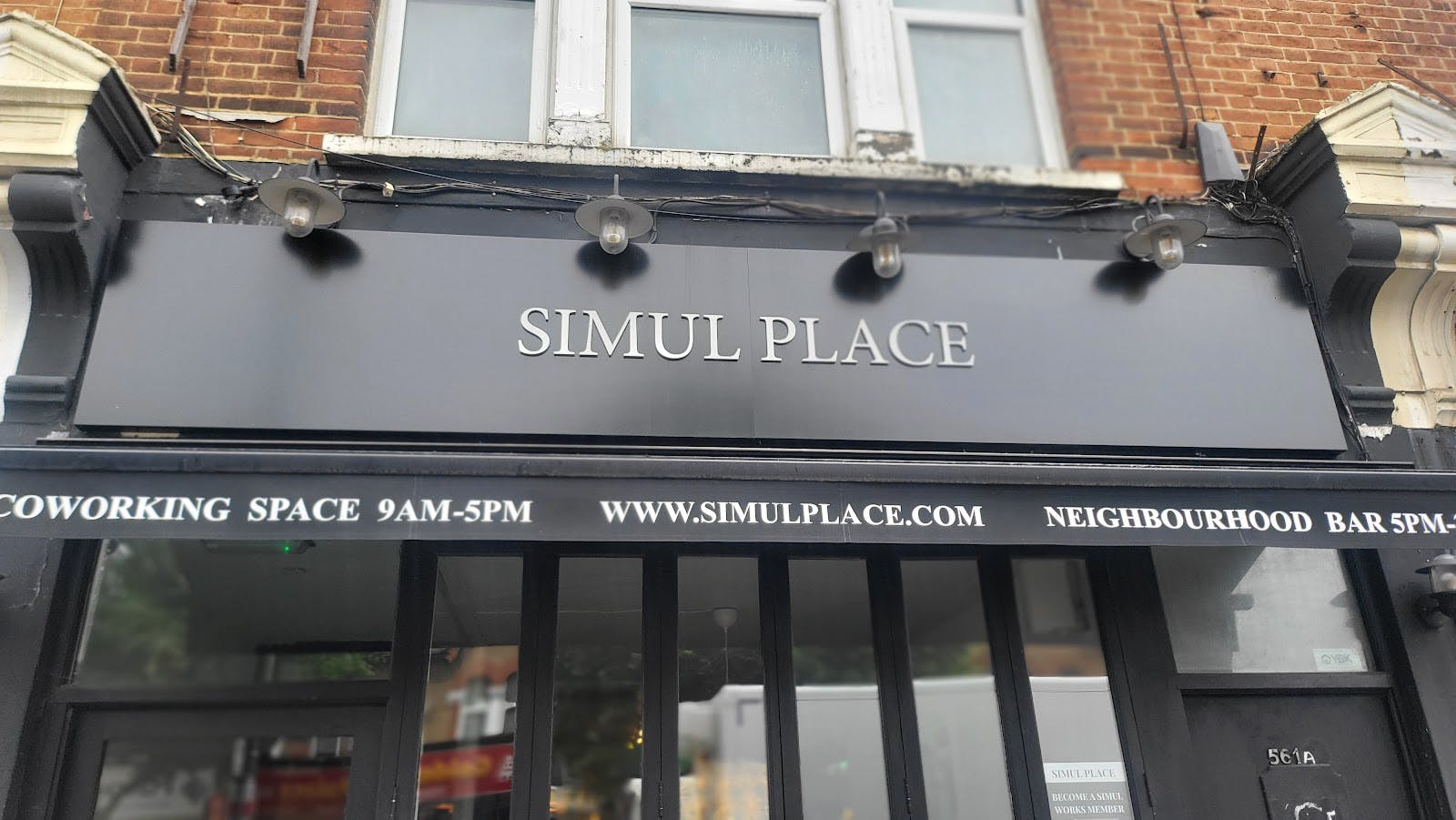 Simul Place storefront, versatile venue for community networking events and professional offsites.