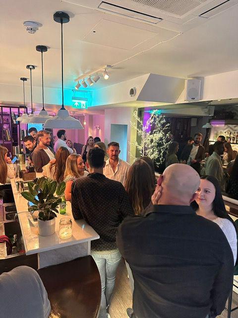 Casual networking mixer at Simul Place bar venue for professional event hire.