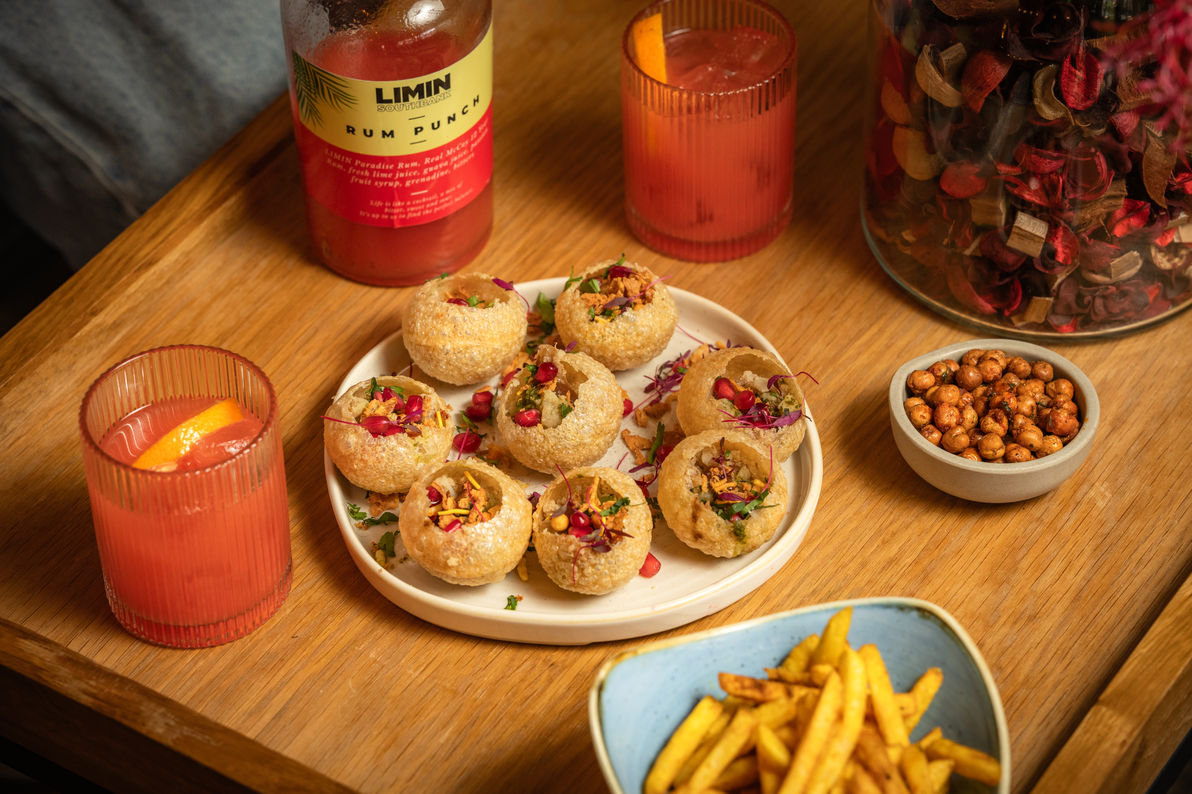 Vibrant appetizer spread with pani puri for networking events and casual meet-ups.