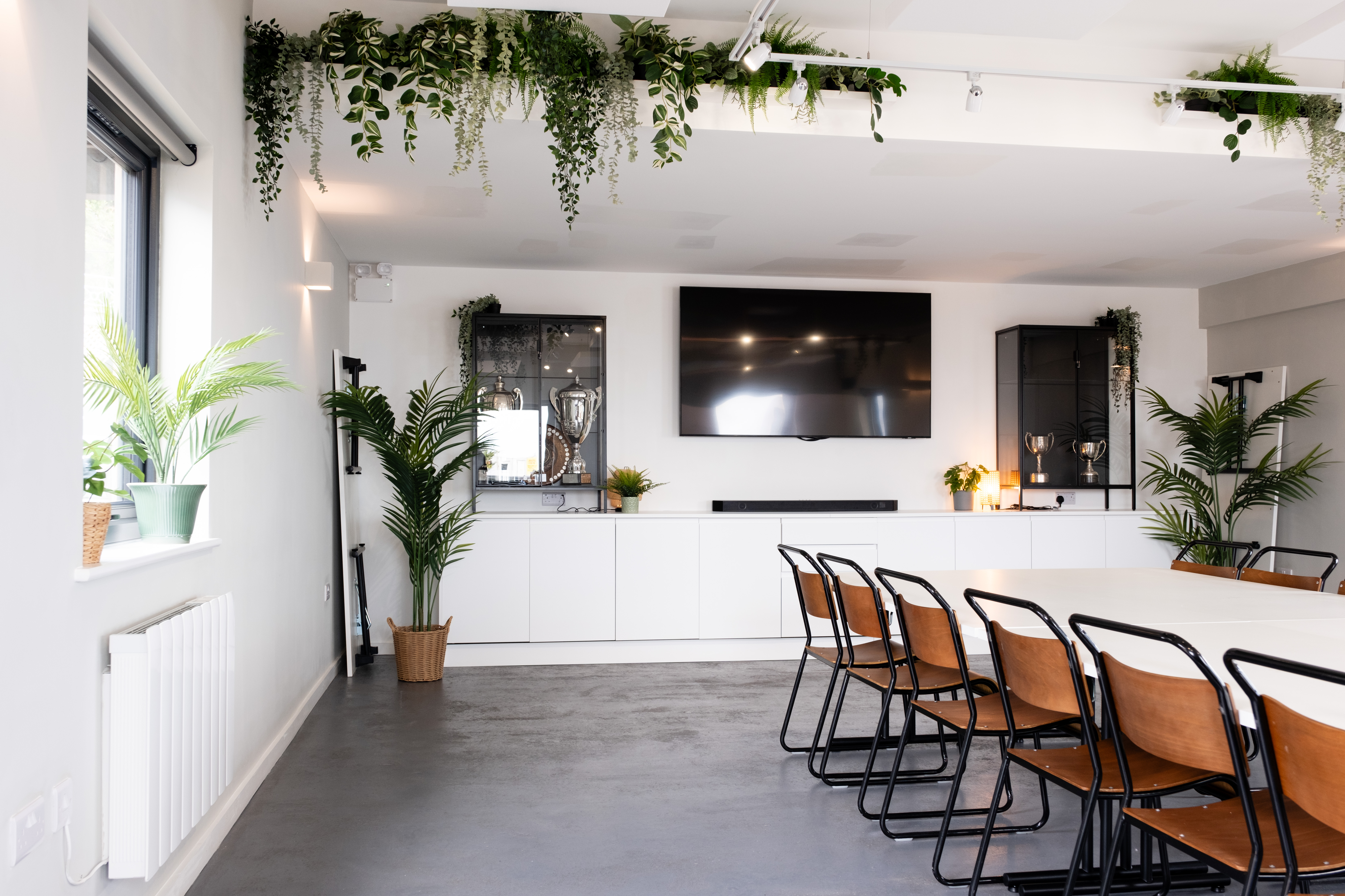 Modern boardroom at The Clubhouse Brighton for strategy sessions and workshops.