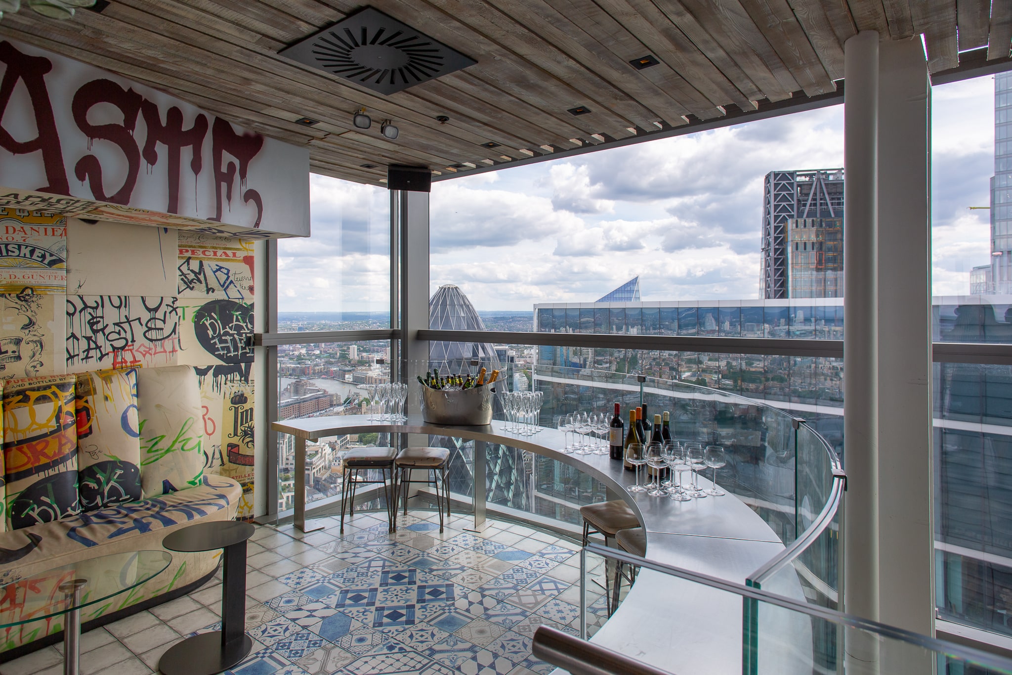 Semi-private bar event space at Duck & Waffle with panoramic city views, ideal for gatherings.
