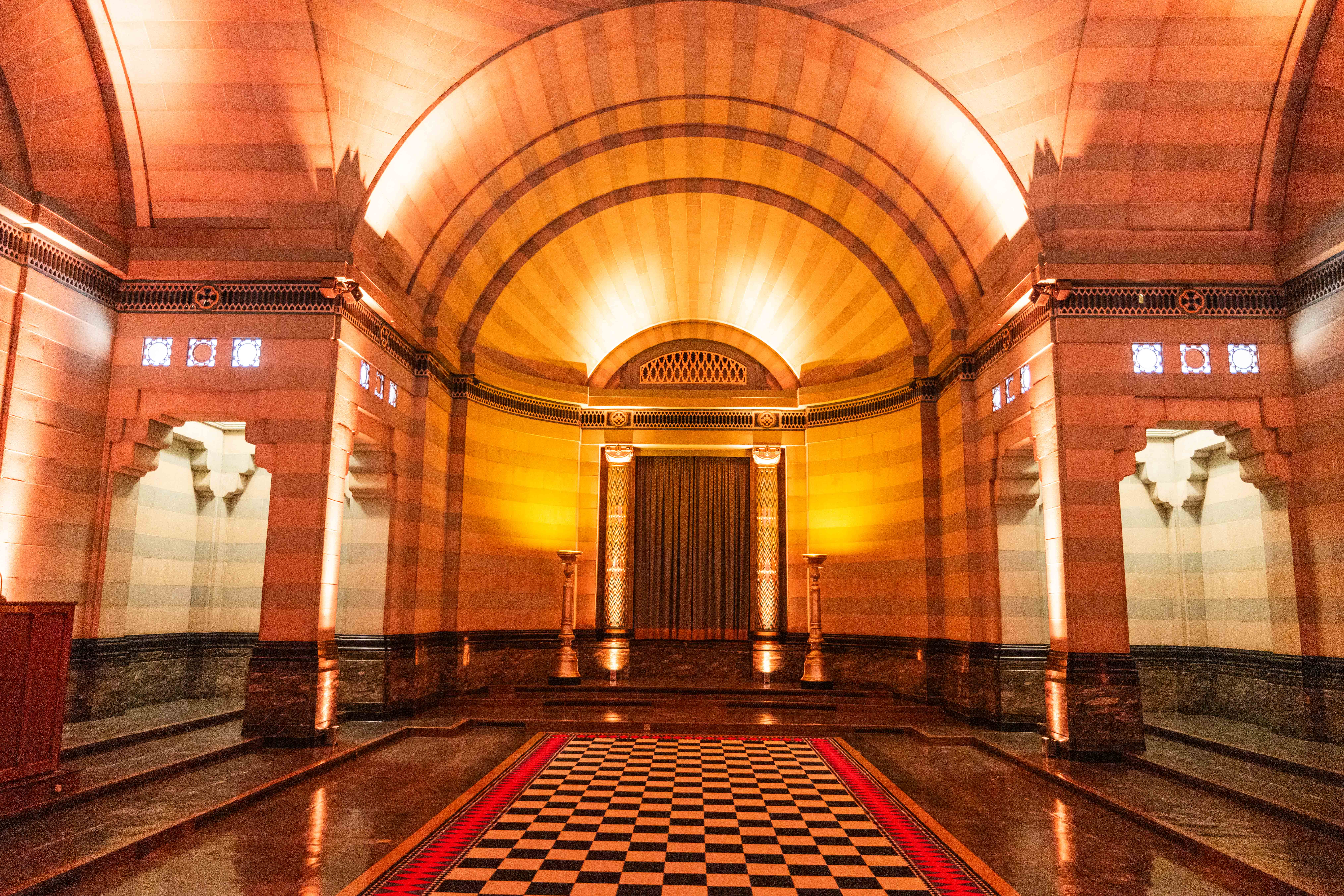 Elegant Egyptian Room with checkerboard floor for upscale events and weddings.