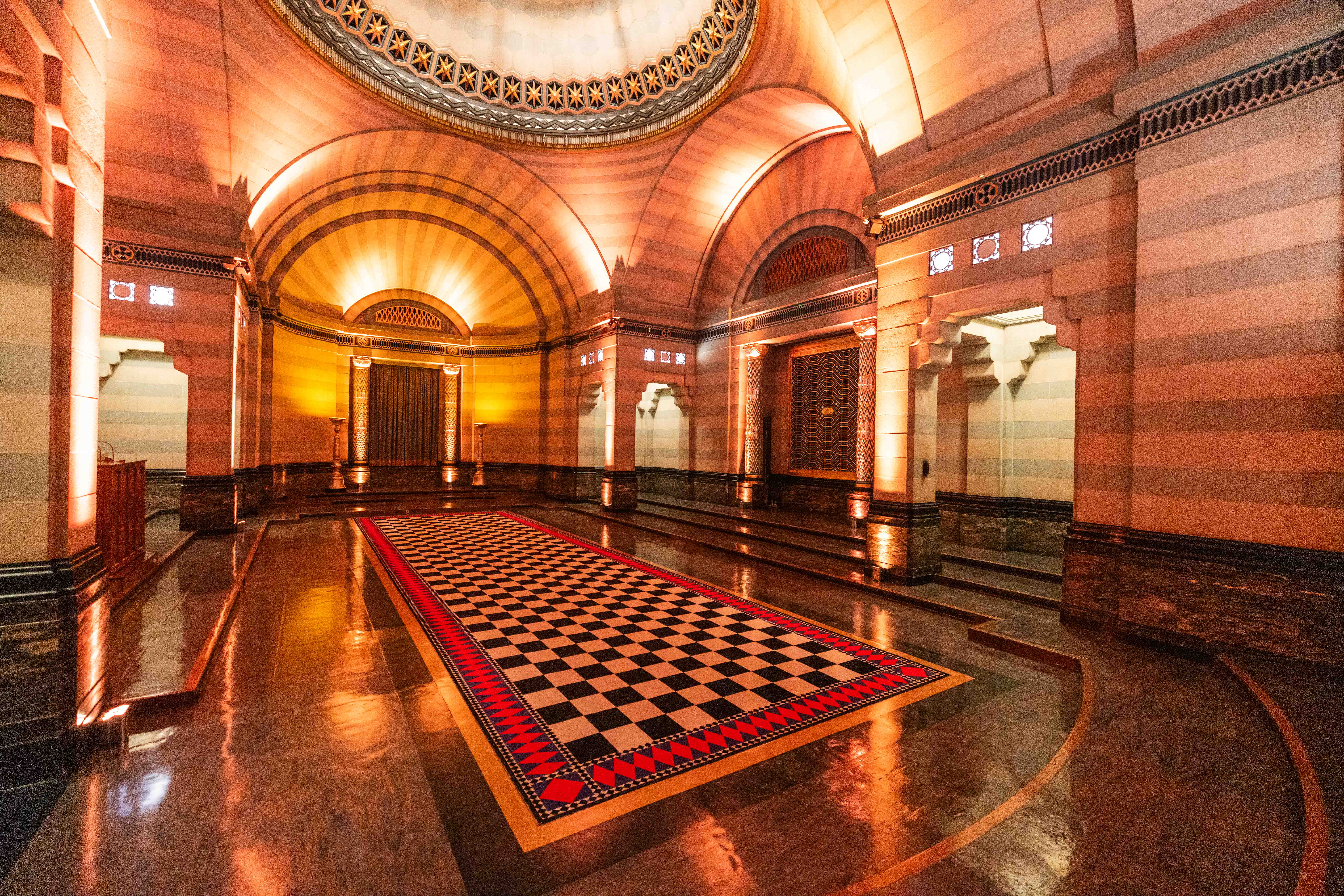 Opulent Egyptian Room event space with grand architecture for upscale events.