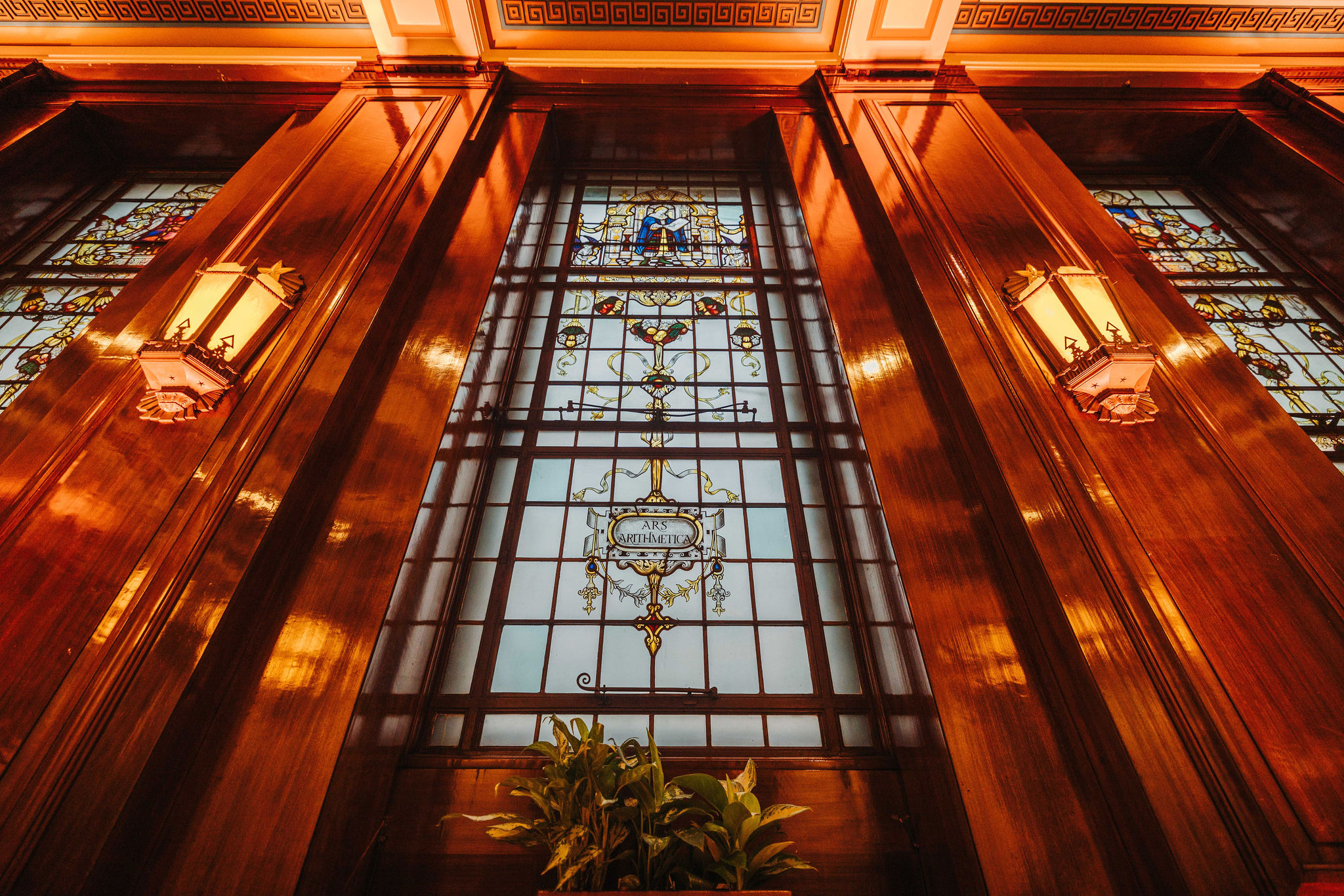 Elegant Old Boardroom with stained glass, perfect for formal events and gatherings.