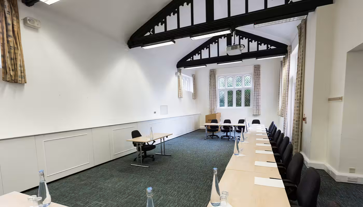 Red Lodge meeting room at Ashridge House, bright space for workshops and conferences.