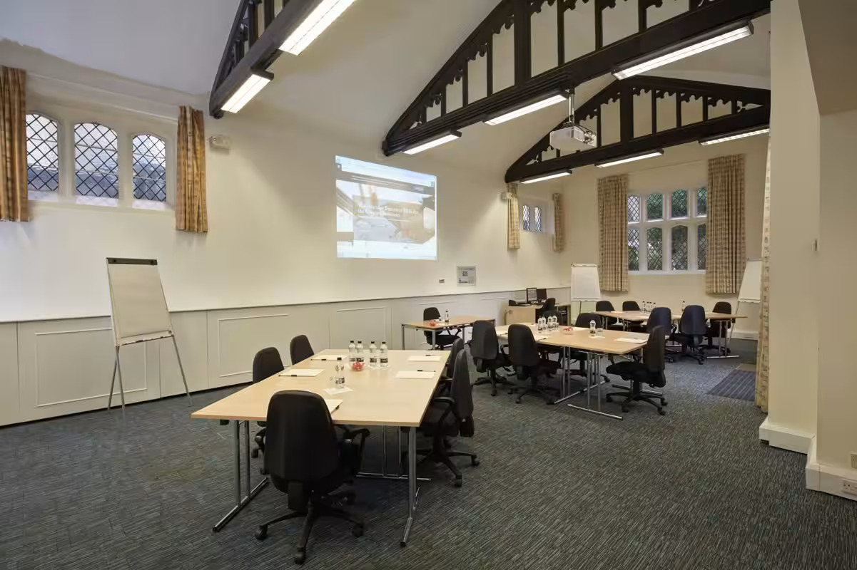 Red Lodge meeting space at Ashridge House, ideal for workshops and presentations.