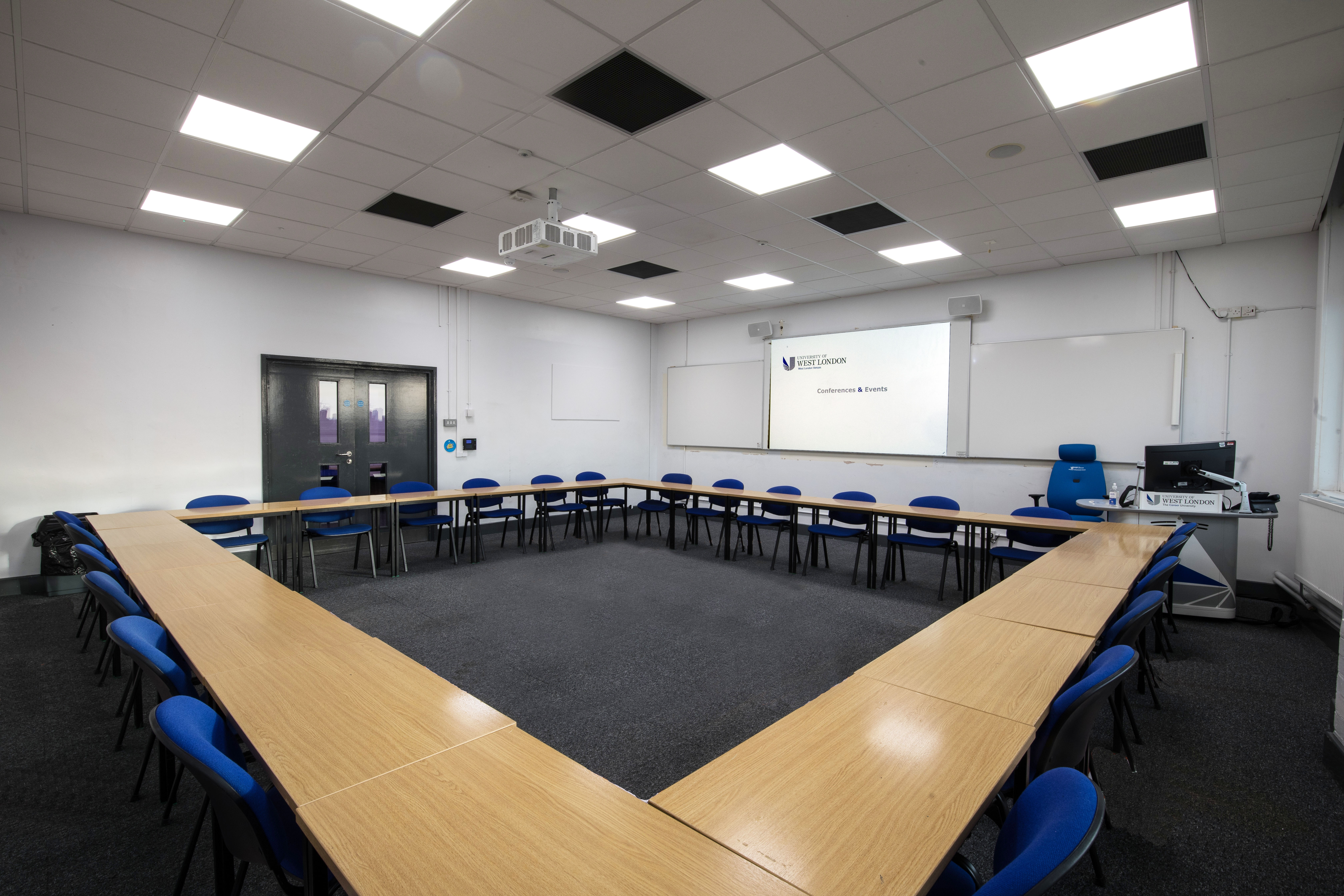U-shaped meeting room at University of West London, ideal for presentations and discussions.