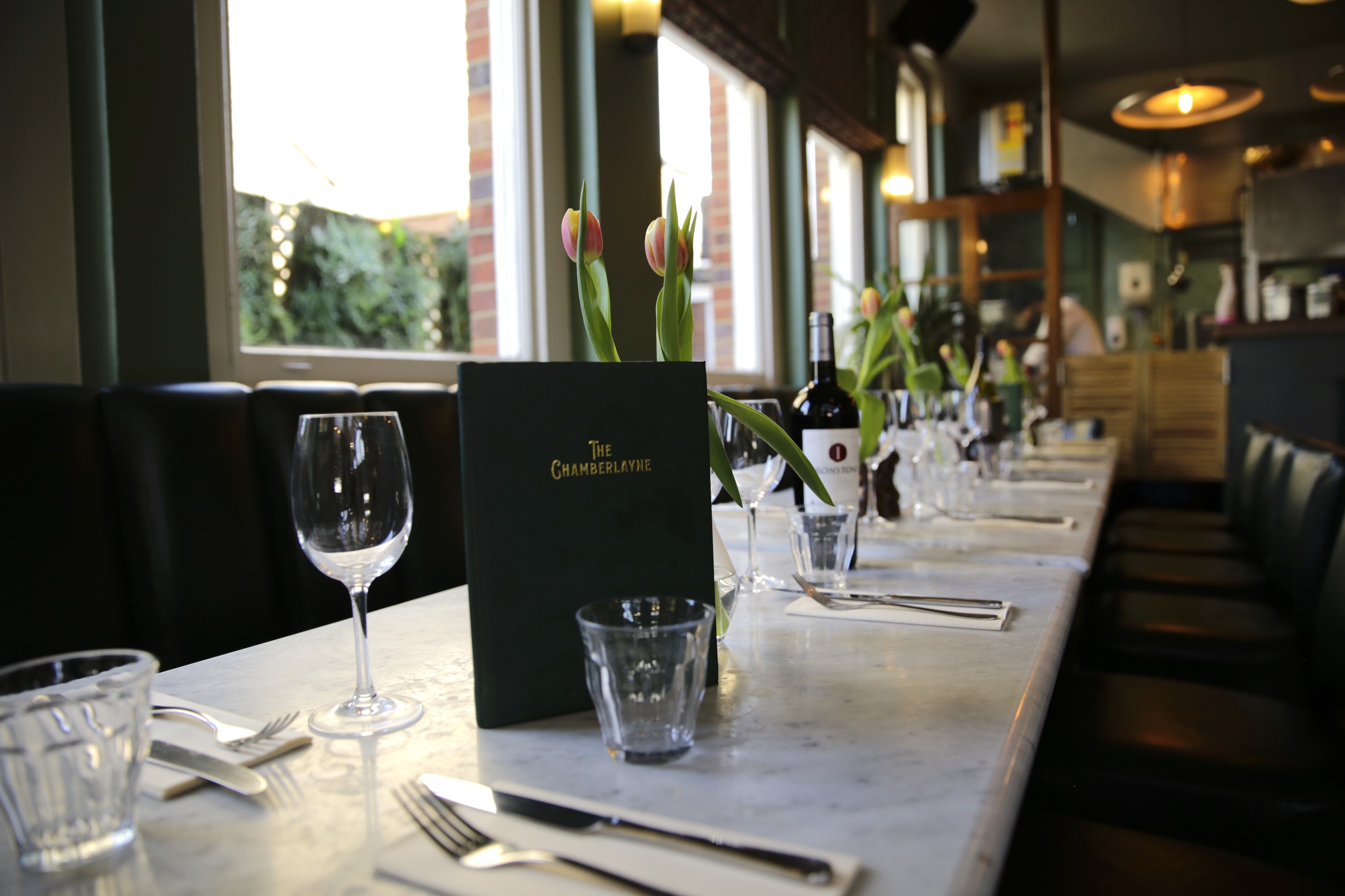 Elegant Dining Room at The Chamberlayne with long table, perfect for corporate dinners and events.