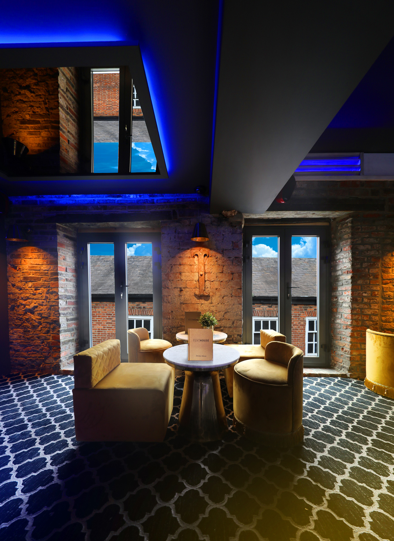 Penthouse in Fibre: Exposed brick breakout space for VIP networking and strategy sessions.