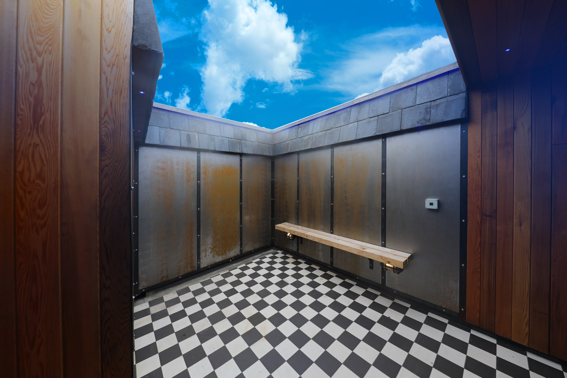 Minimalist penthouse breakout space for wellness sessions and VIP retreats.