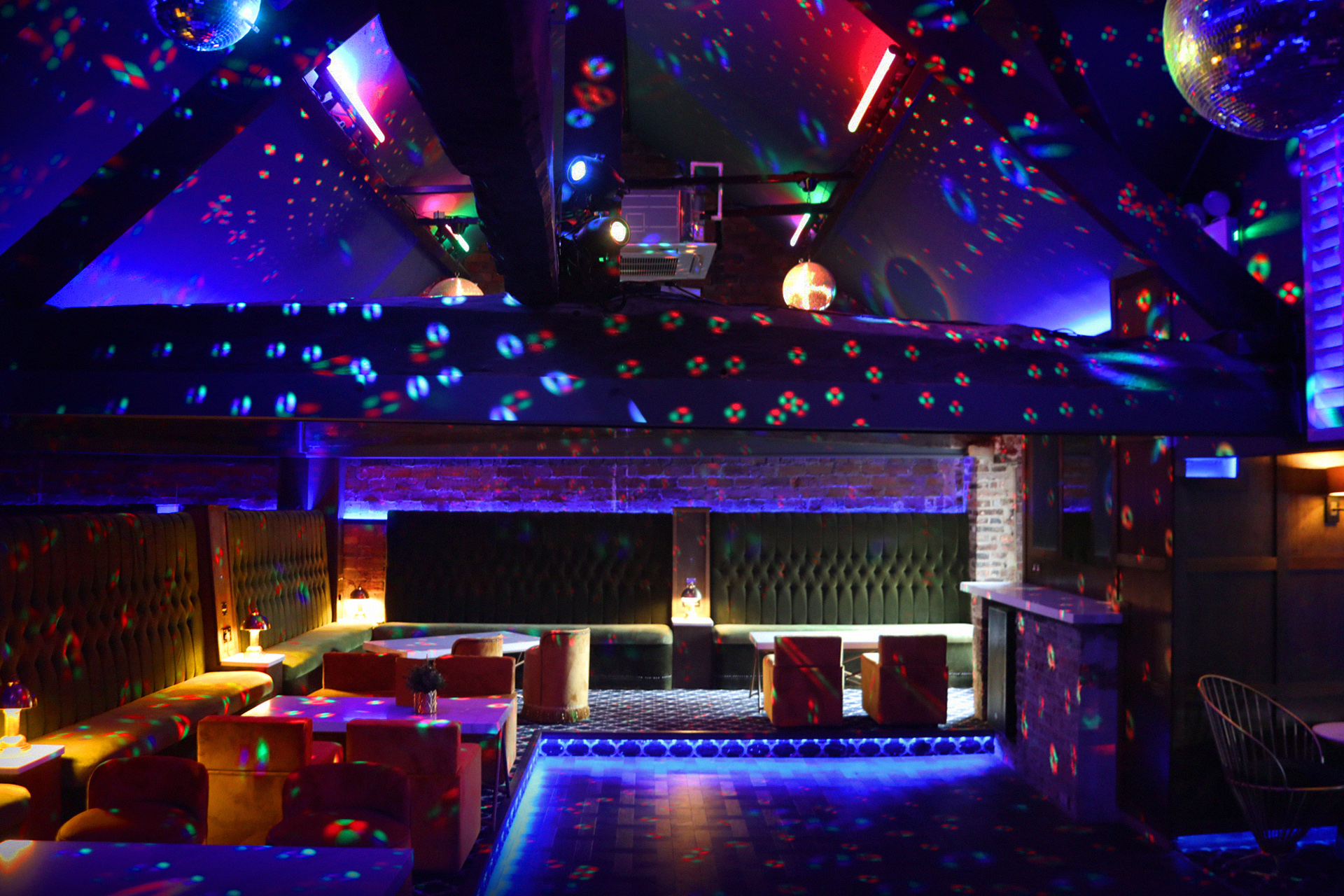 Penthouse in Fibre: moody lighting and patterned projections for an immersive party reception.