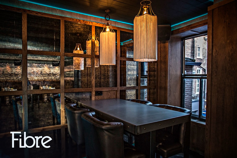 Middle Floor board meeting room with leather seating for VIP dinners and corporate events.