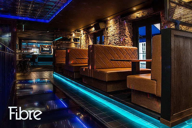 Fibre Middle Floor lounge with chic LED lighting for VIP events and networking.