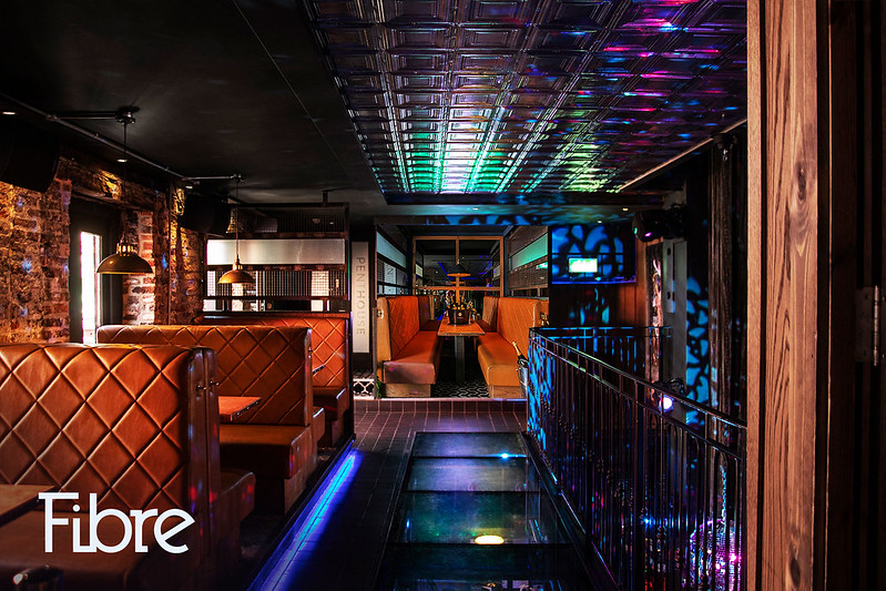 Fibre Middle Floor lounge with booth seating for corporate networking and happy hour events.