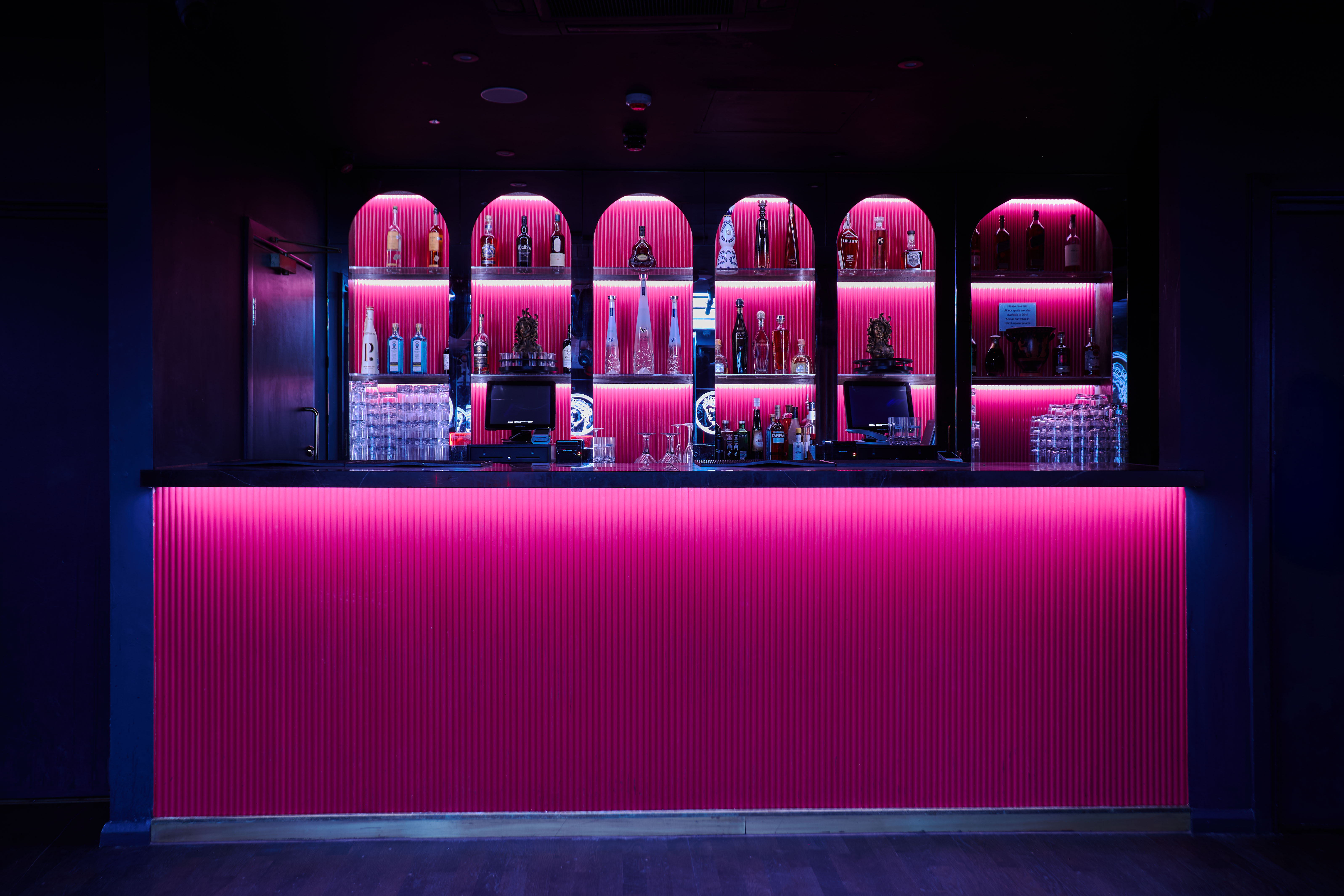 Selene London built-in bar with LED uplighting for evening networking and gala receptions.