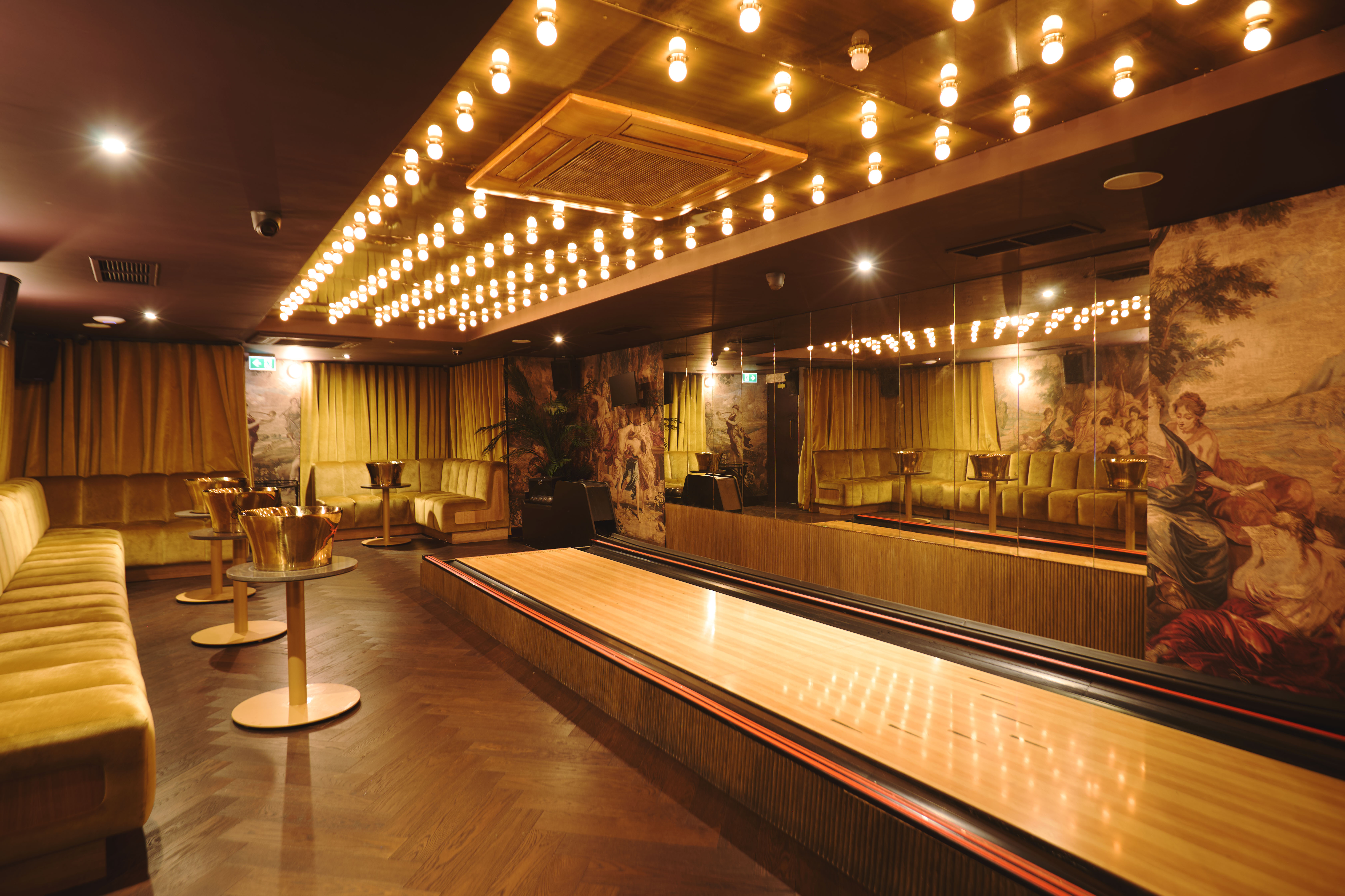 VIP bowling room in Selene London, featuring sleek boutique design for corporate team-building.