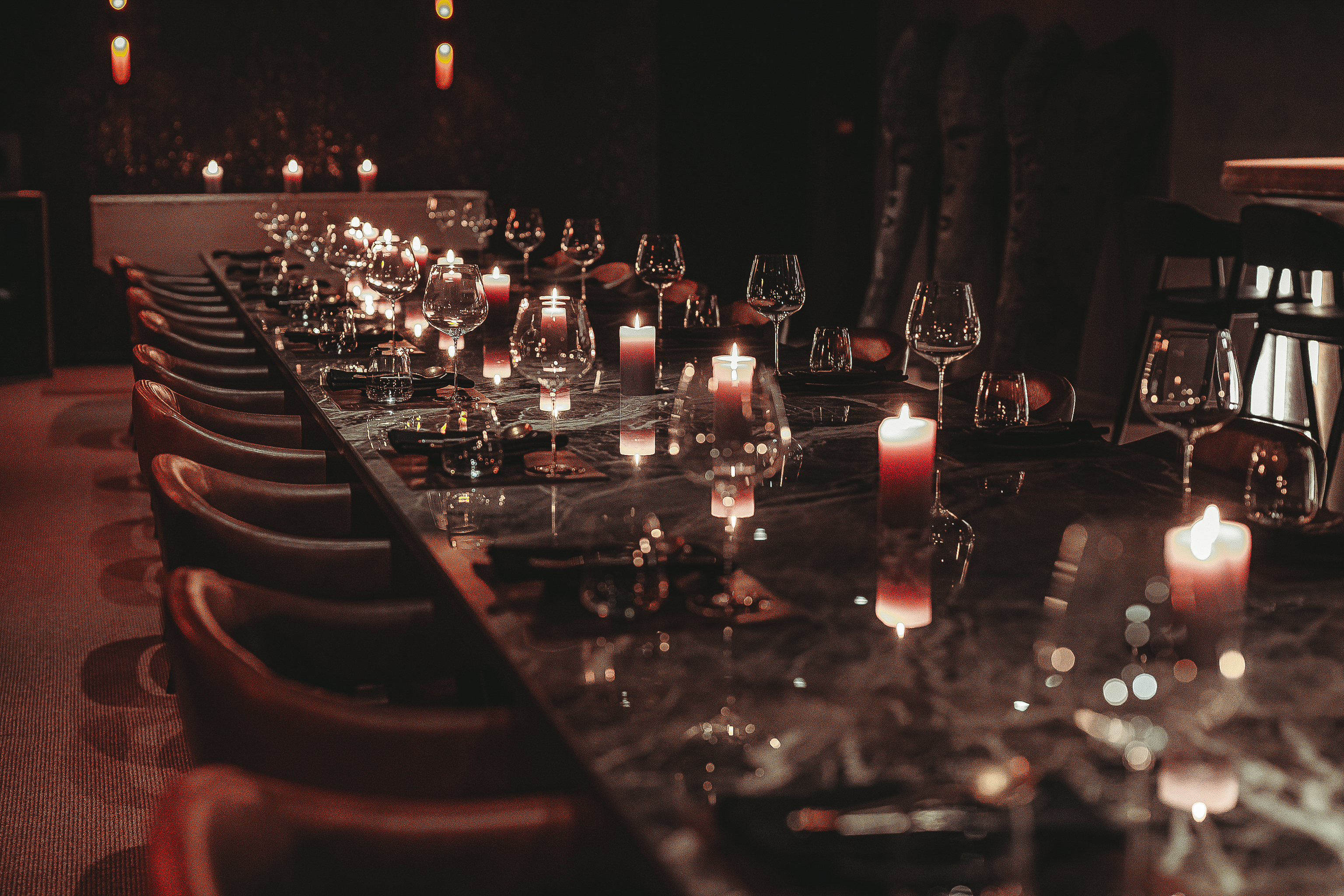Intimate Etna in Hora private dining with marble table for VIP dinners and networking events.
