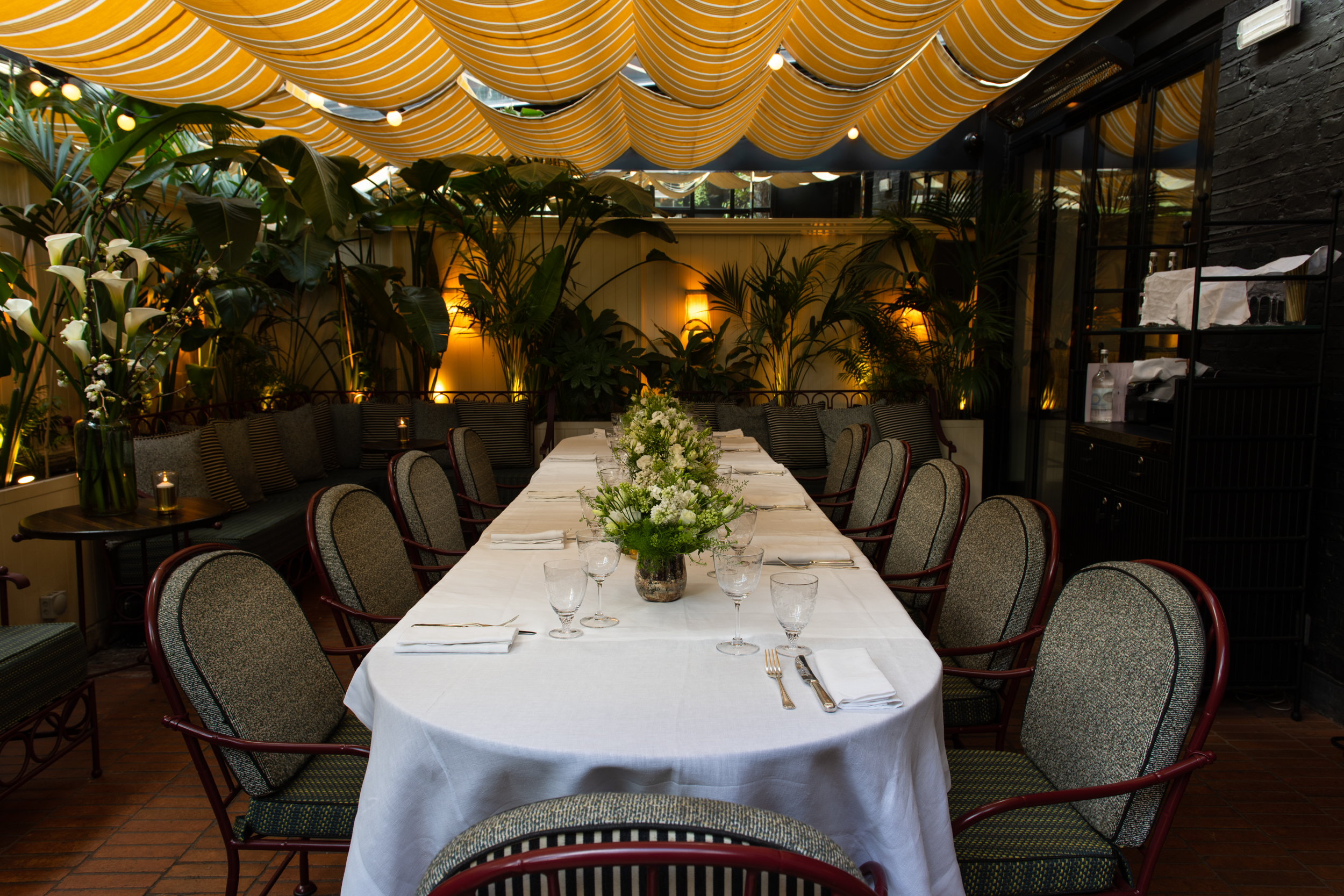 Terrace at House of Louie: elegant table setup for corporate meetings or dining events.