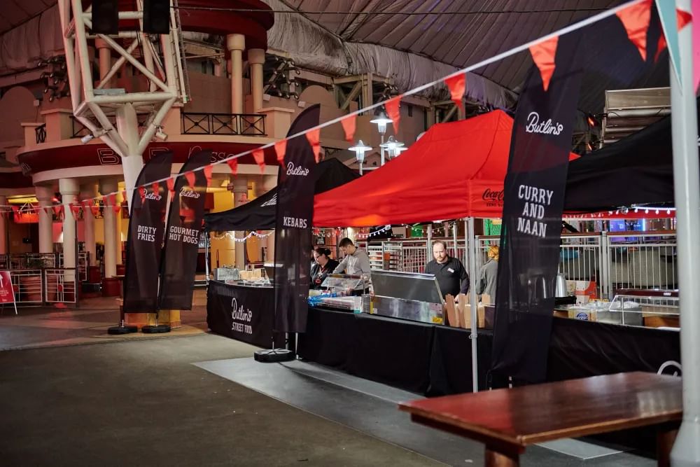 Vibrant conference centre in Butlin's Bognor Regis with food stalls for events