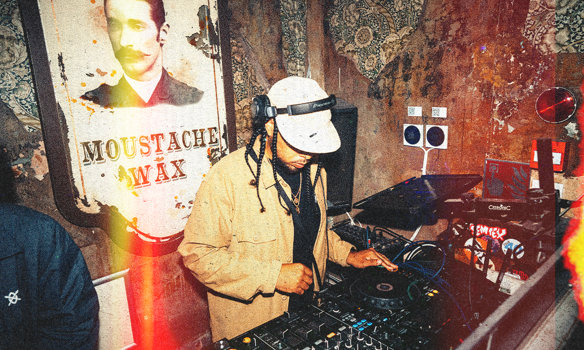 DJ performing in The Clubroom at The Old Queen's Head, vibrant venue for events.
