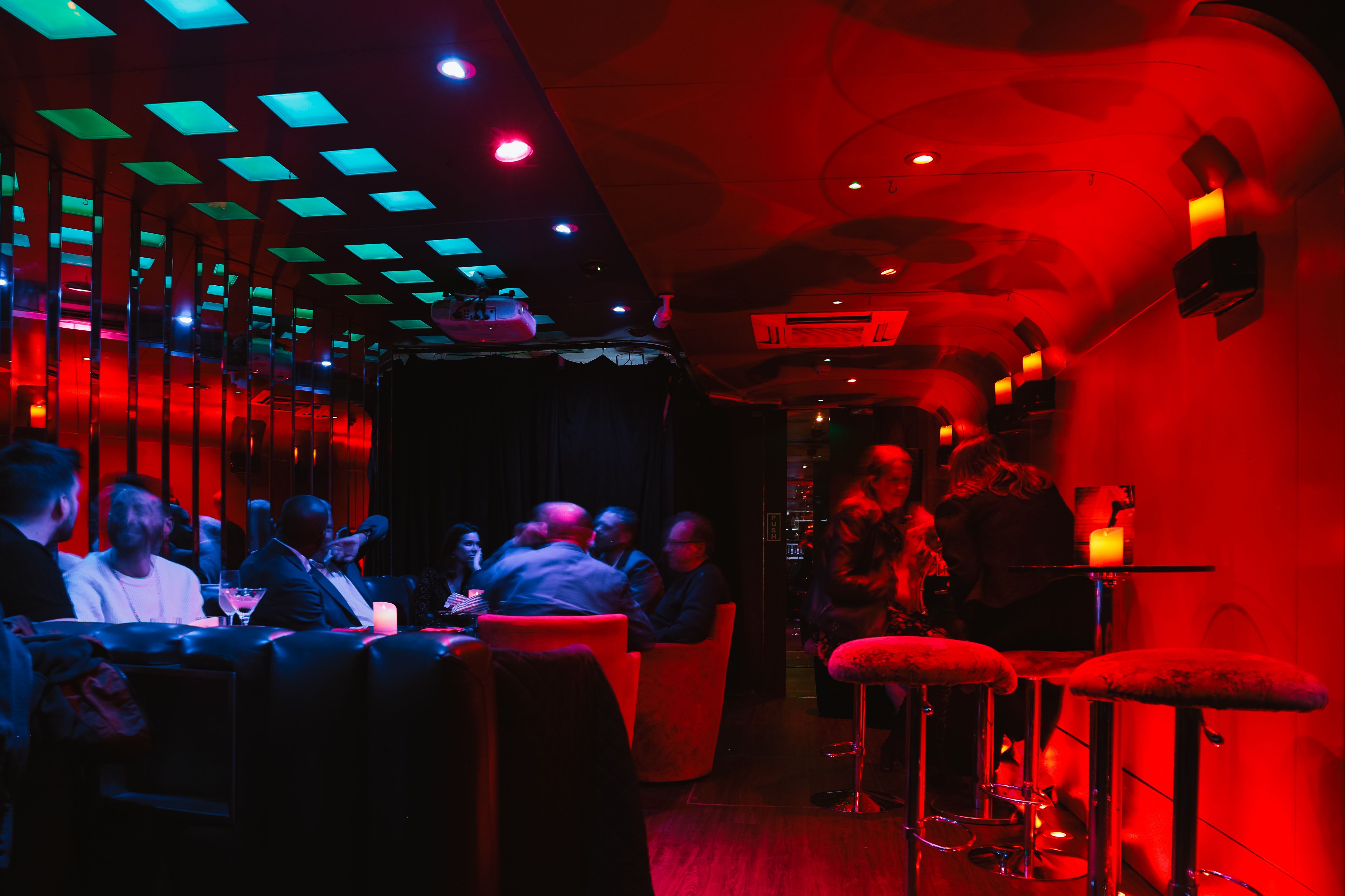 Vibrant CellarDoor venue with dramatic lighting for intimate gatherings and cocktail receptions.