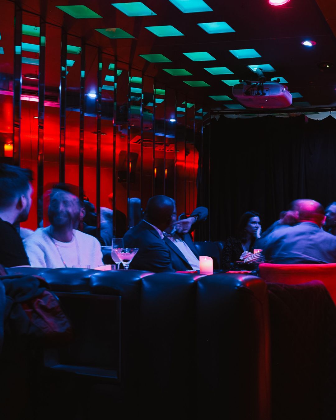 Vibrant networking event at CellarDoor with cocktails and stylish ambiance.