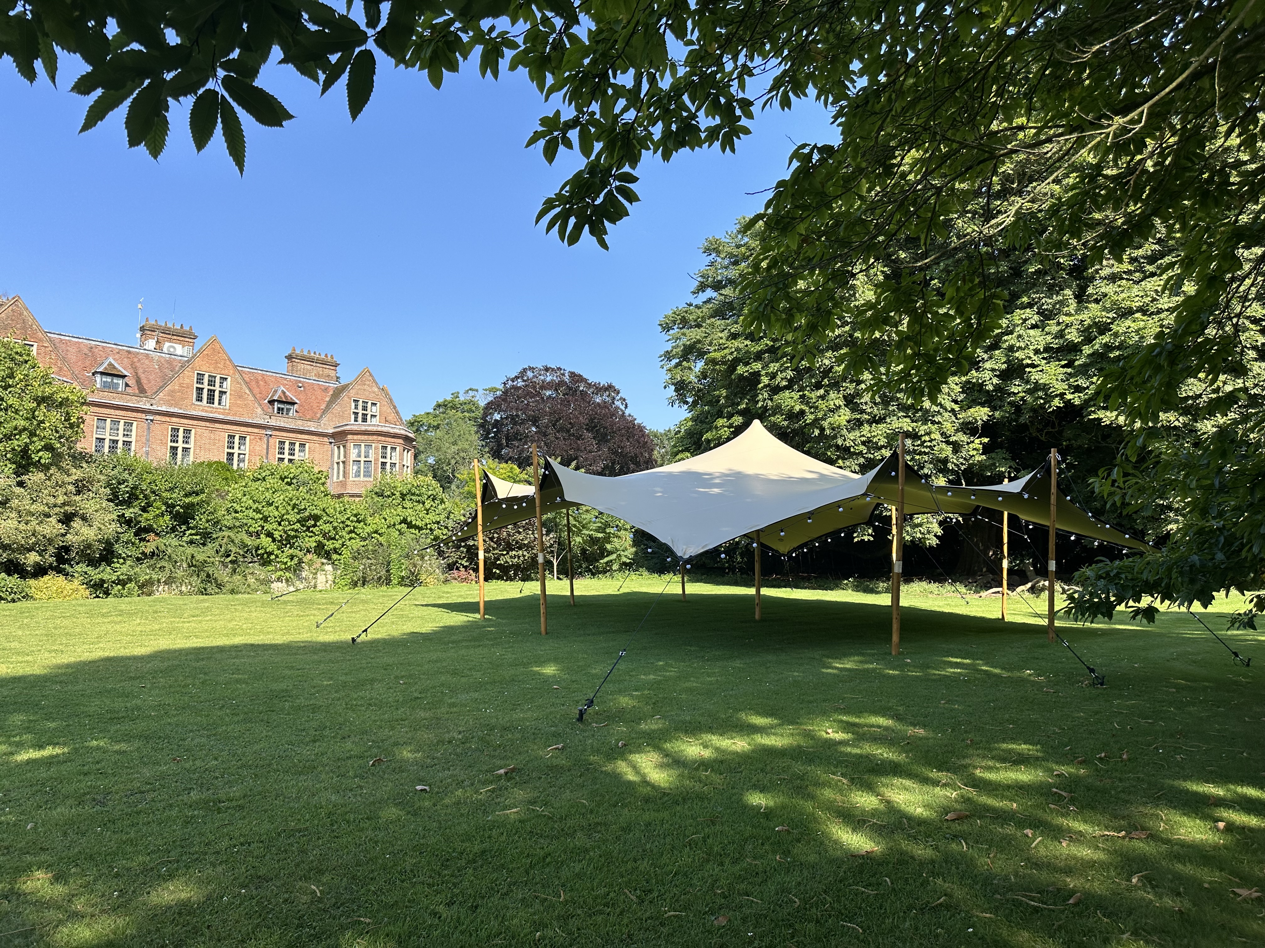 Elegant outdoor tent venue at Eyre Suite, Horwood House for events and gatherings.