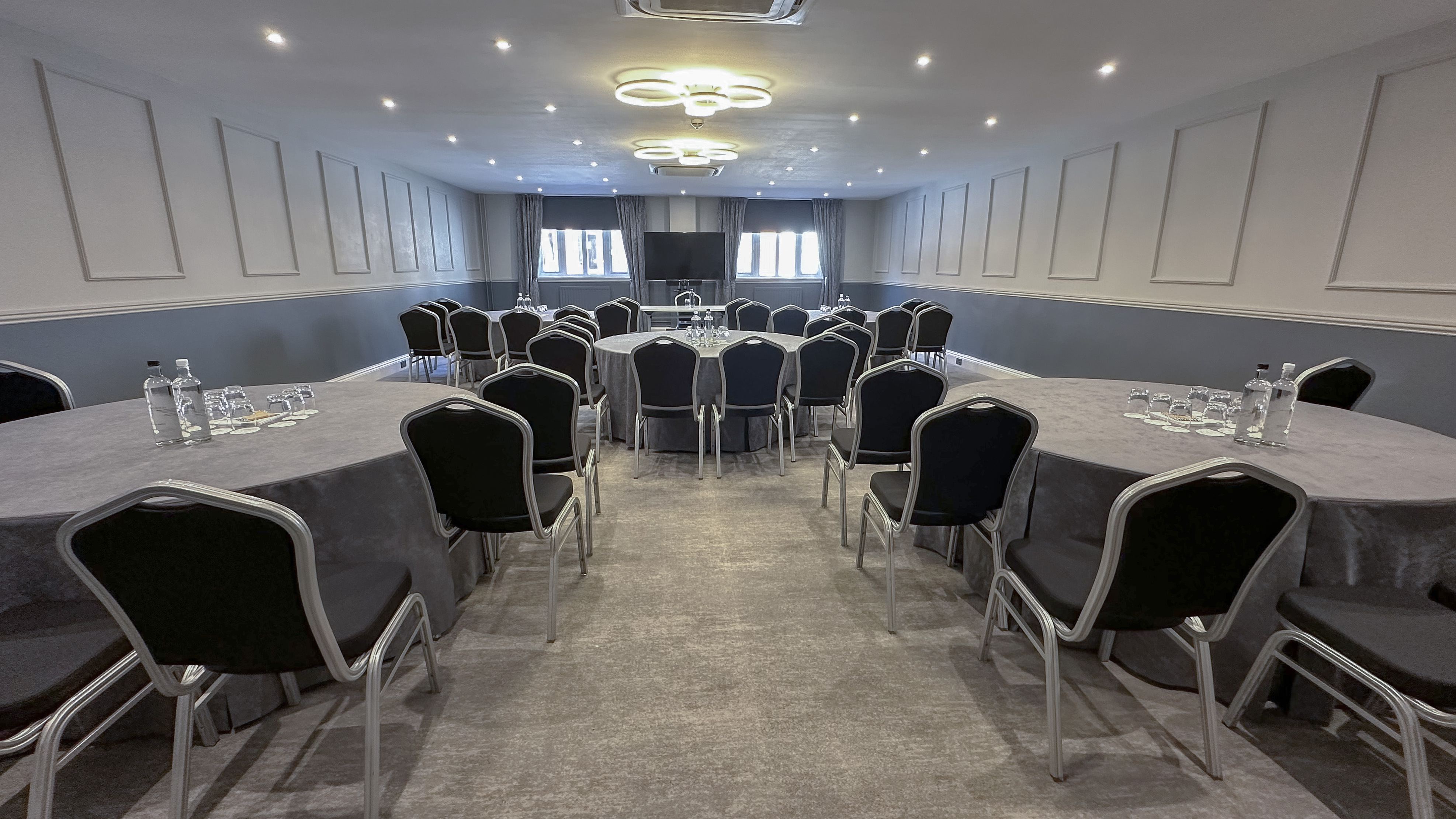 Columbus Suite at Horwood House Hotel: modern meeting space for workshops and presentations.