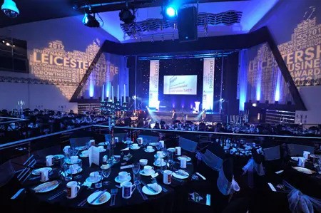 Elegant event setup at Athena Space for Leicestershire Business Awards, featuring fine dining.