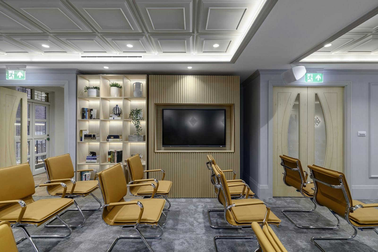 ICfS breakout room with AV wall for professional hybrid workshops and training sessions.