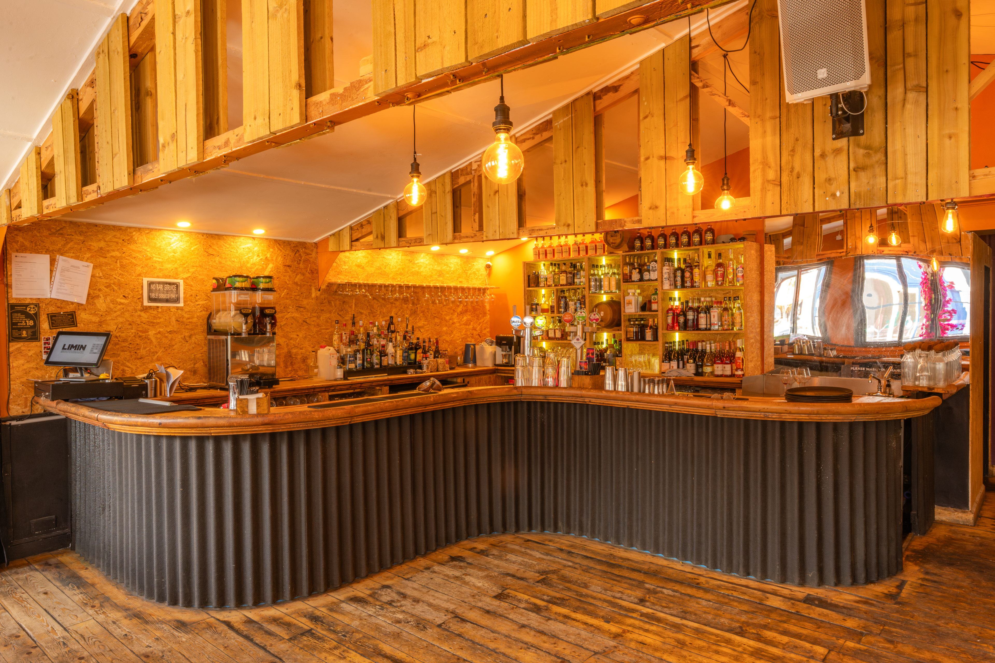 Bird of Paradise Bar at Limin Southbank, cozy wood decor for networking events.