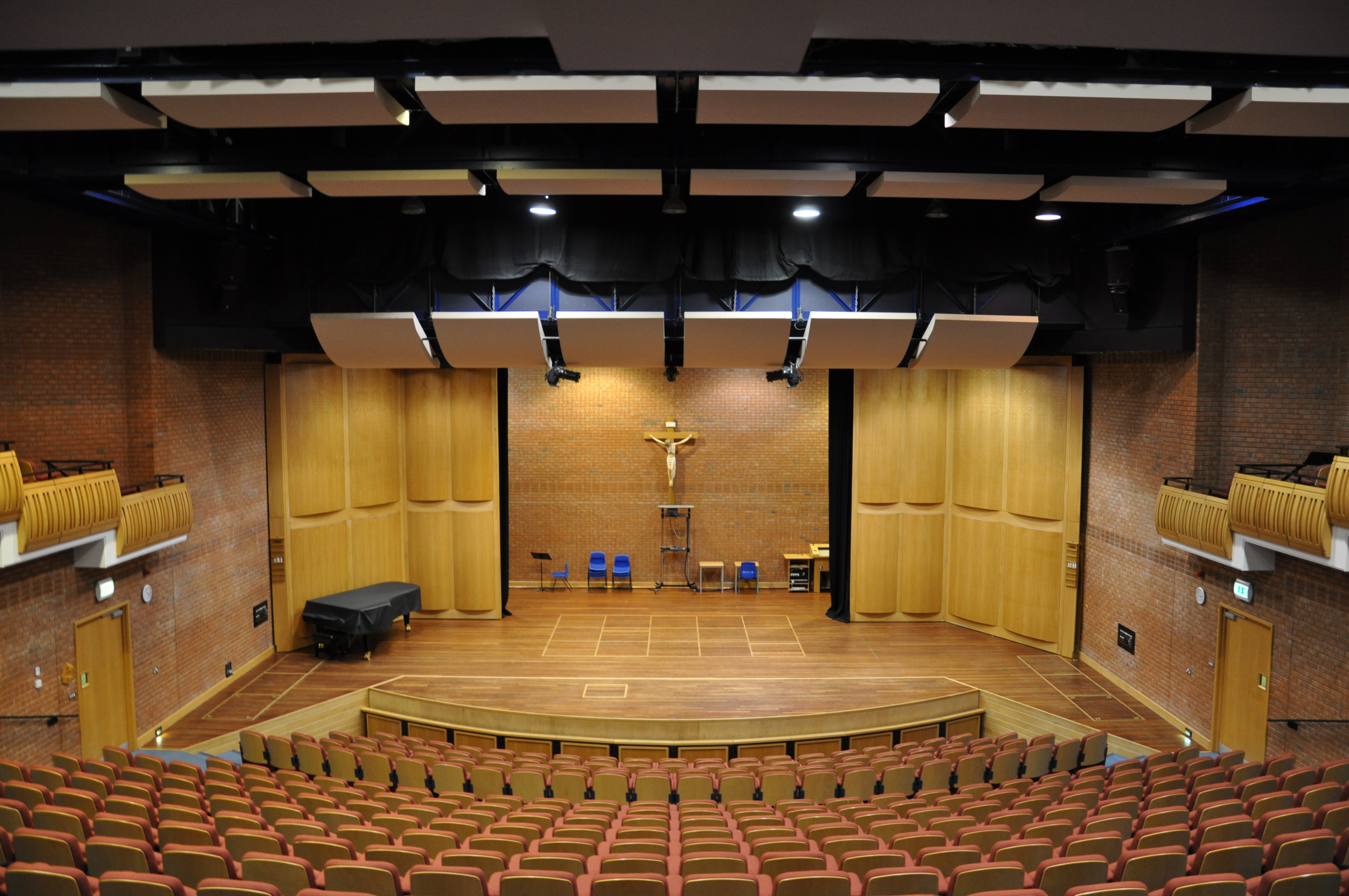 Millennium Theatre auditorium with tiered seating for conferences and presentations.