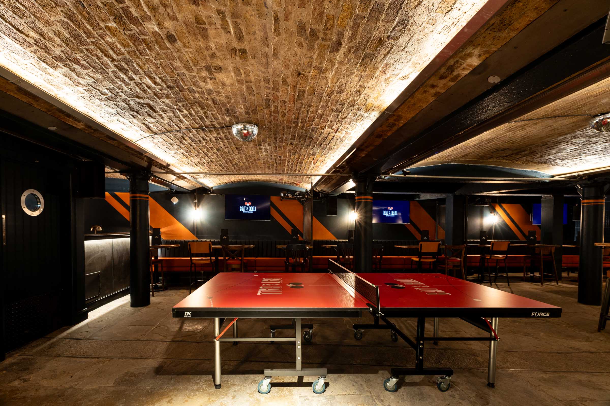 Ping-Pong Parlour in Covent Garden: vibrant event space with exposed brick for networking and team-building.