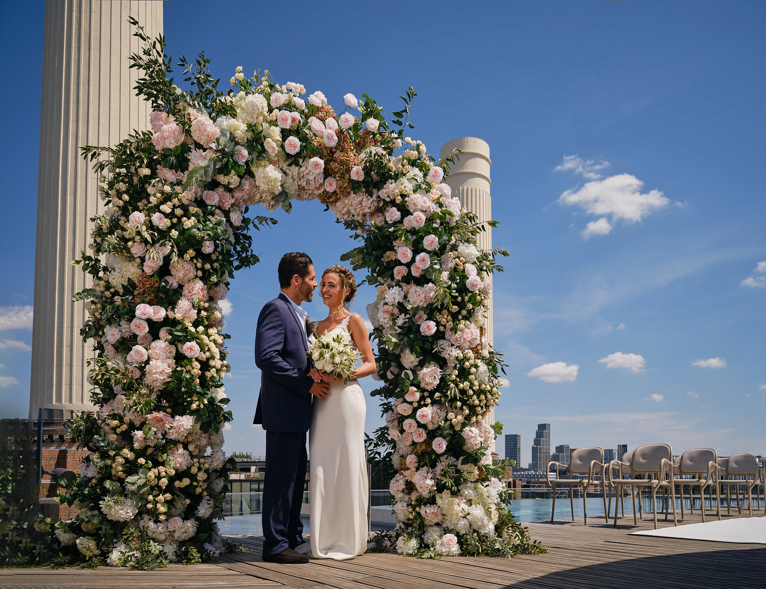 Floral arch at art'otel London Battersea for a romantic wedding ceremony backdrop.