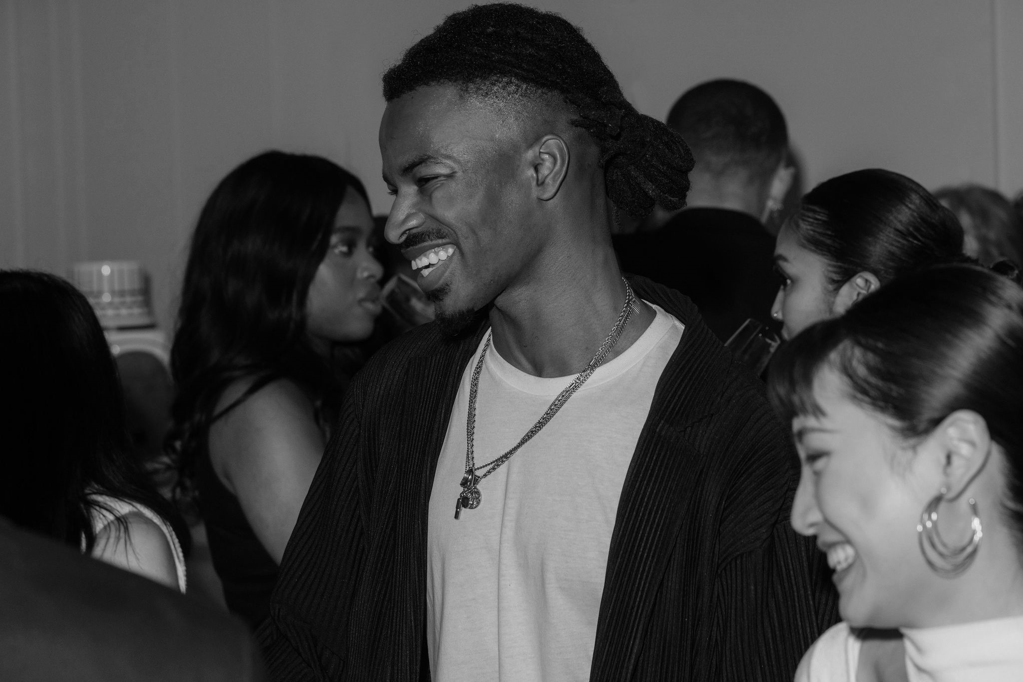 Vibrant networking event at JOIA Rooftop, art'otel London, showcasing engaged attendees.