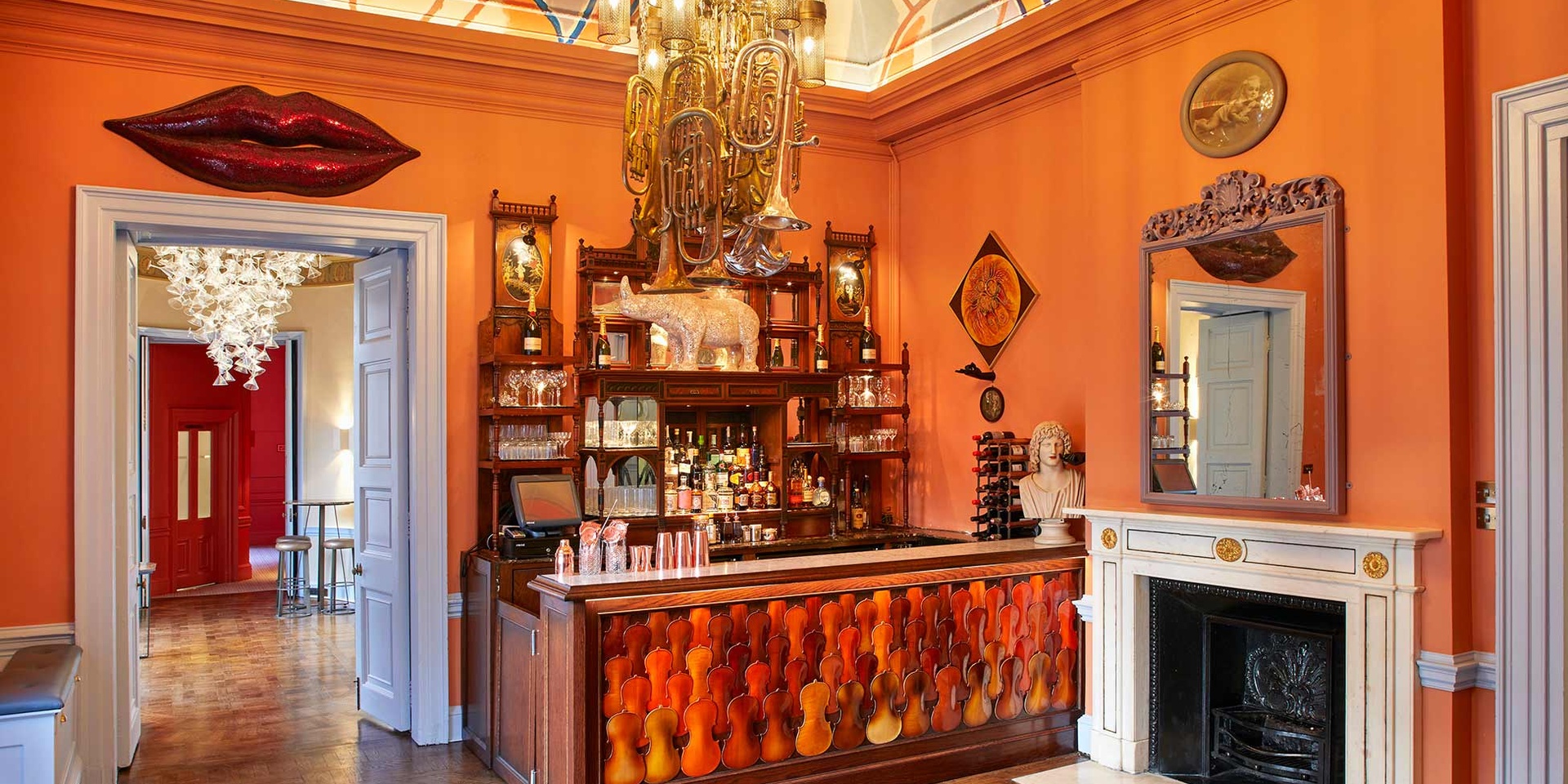 Vibrant bar space with unique decor for creative events and cocktail parties.