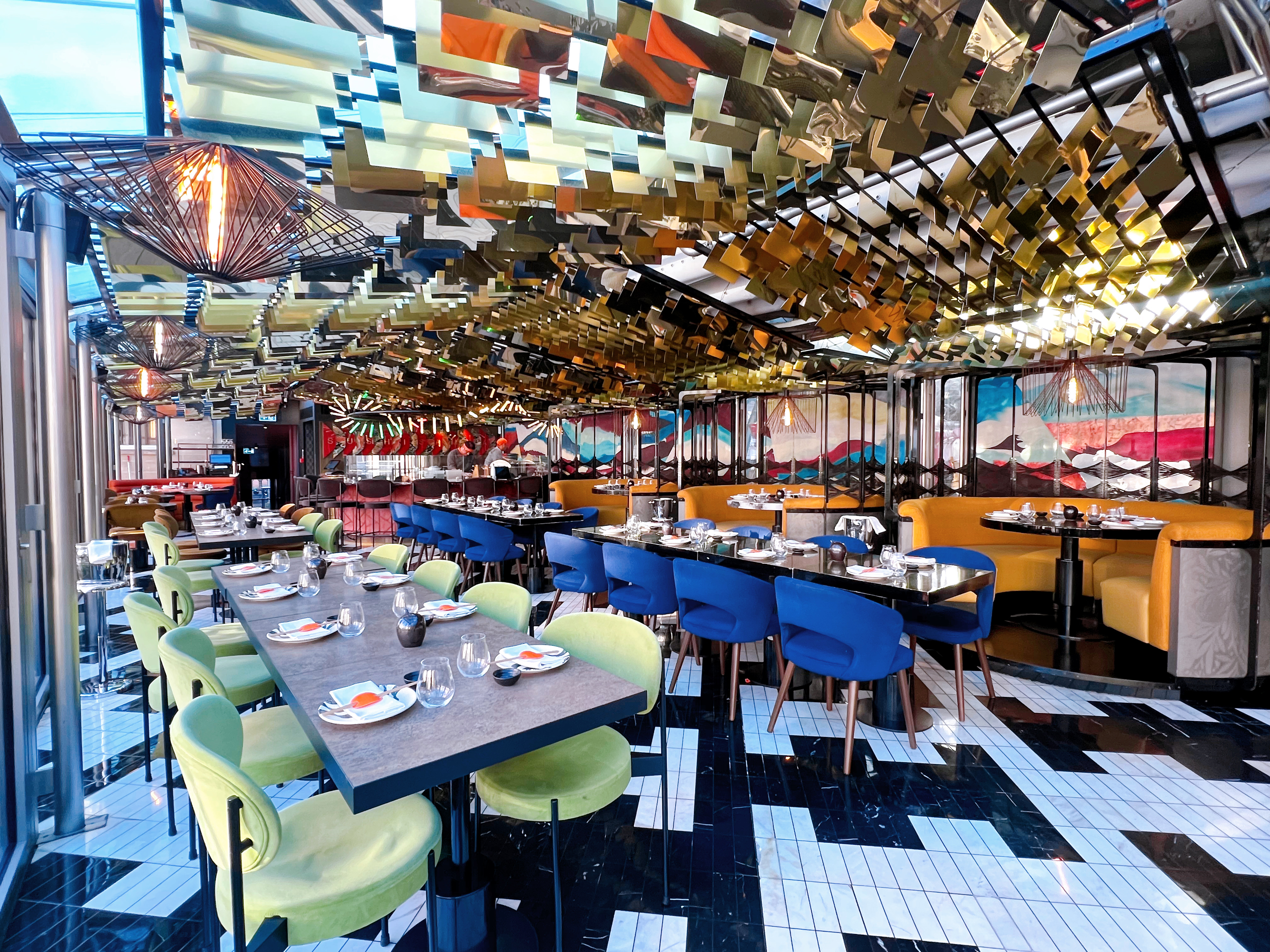 Vibrant SUSHISAMBA Covent Garden restaurant ideal for group events, featuring colorful seating.