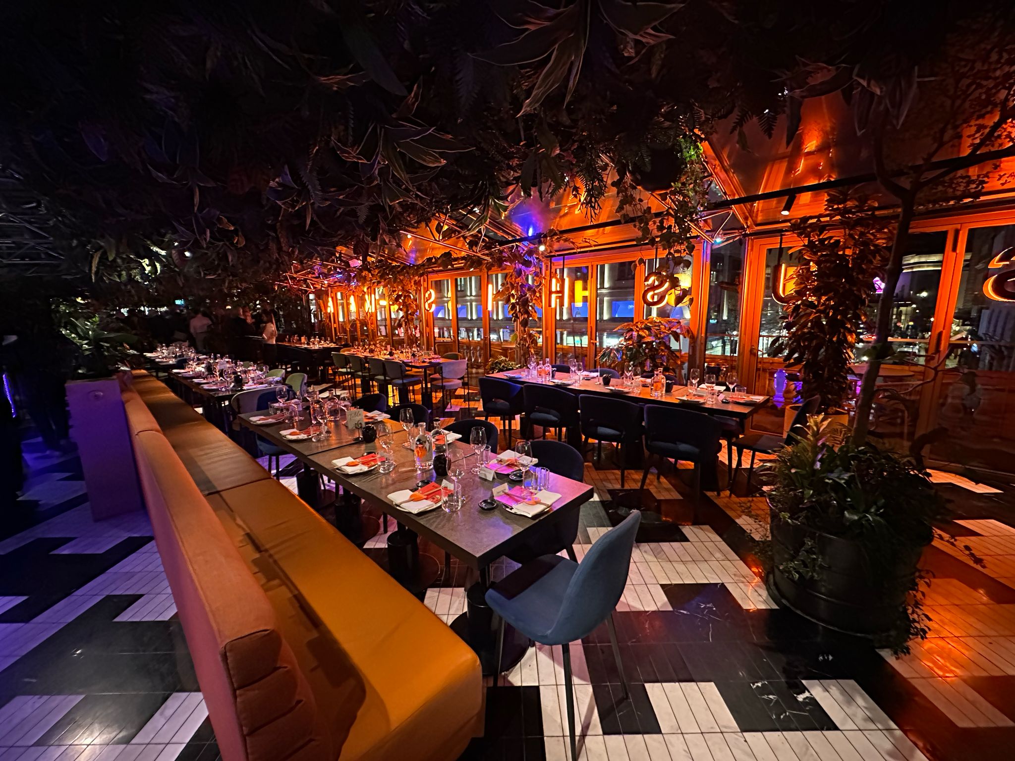 Upscale restaurant event space at SUSHISAMBA Covent Garden with elegant table arrangements.