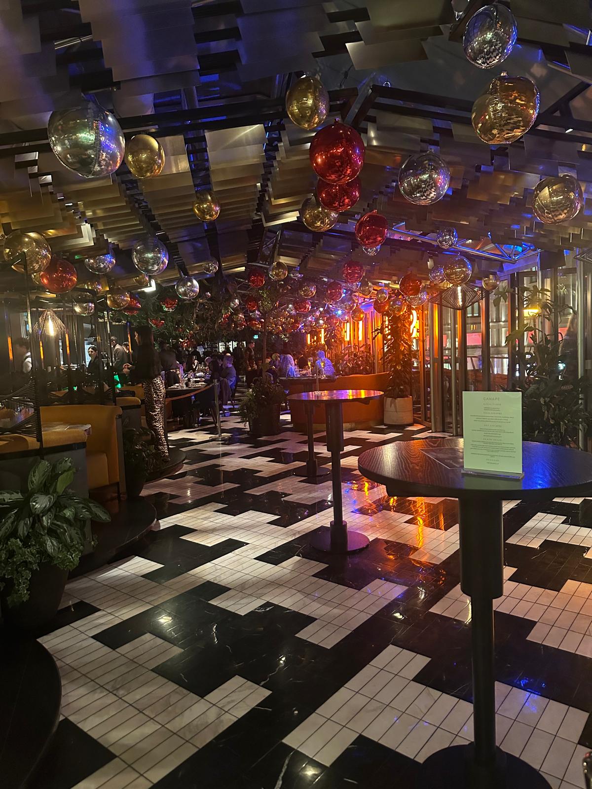 Vibrant SUSHISAMBA Covent Garden venue with festive decor for networking events.
