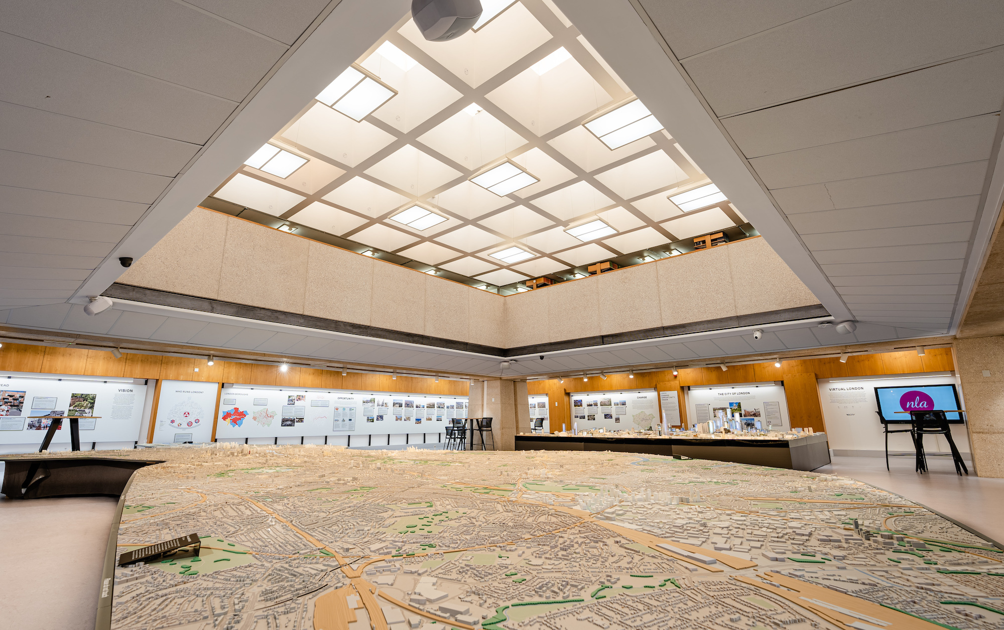 Modern London Centre gallery with immersive model for architectural summits and networking events.